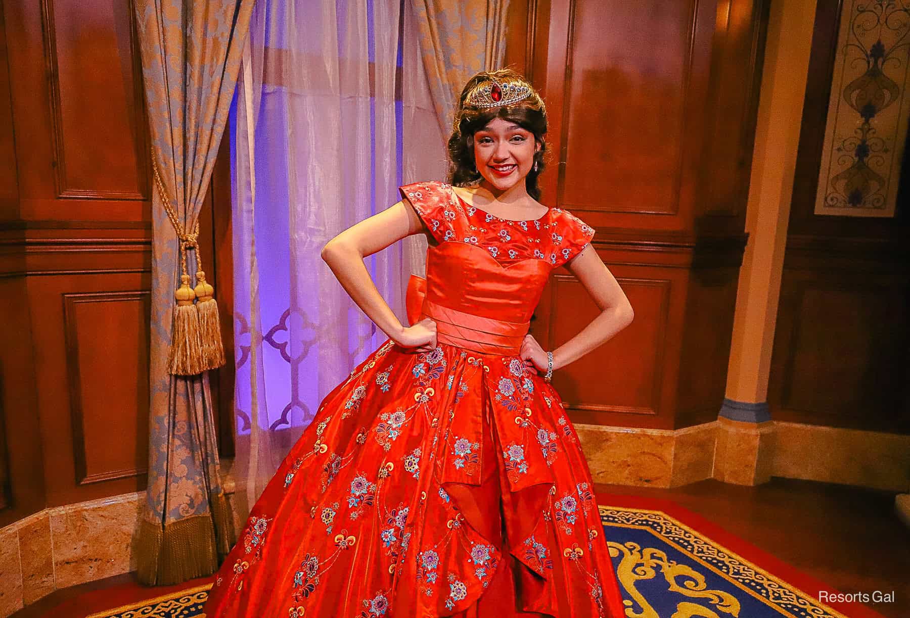 Princess Elena of Avalor wearing her red dress with jeweled crown. 