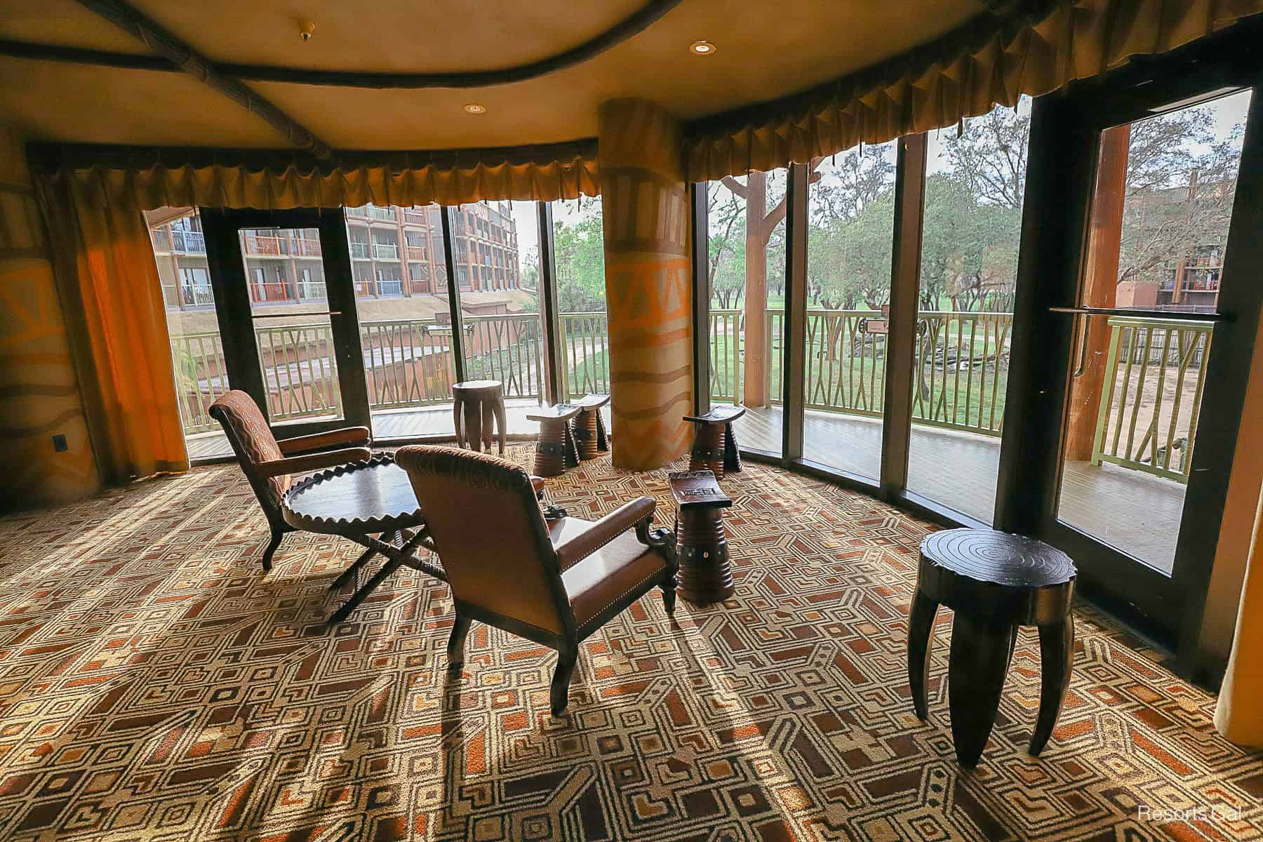 a lounge relax area at Animal Kingdom Lodge that's inside but you can still see the savanna 