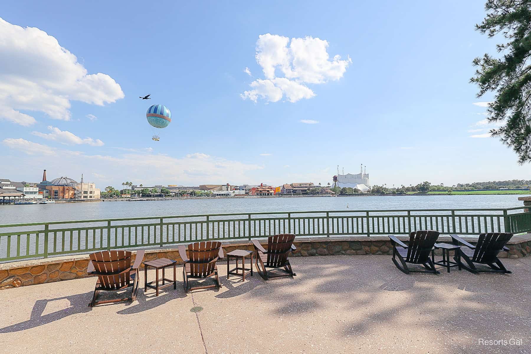 a couple of chairs looking to some of the restaurants at Disney Springs from Saratoga Springs 