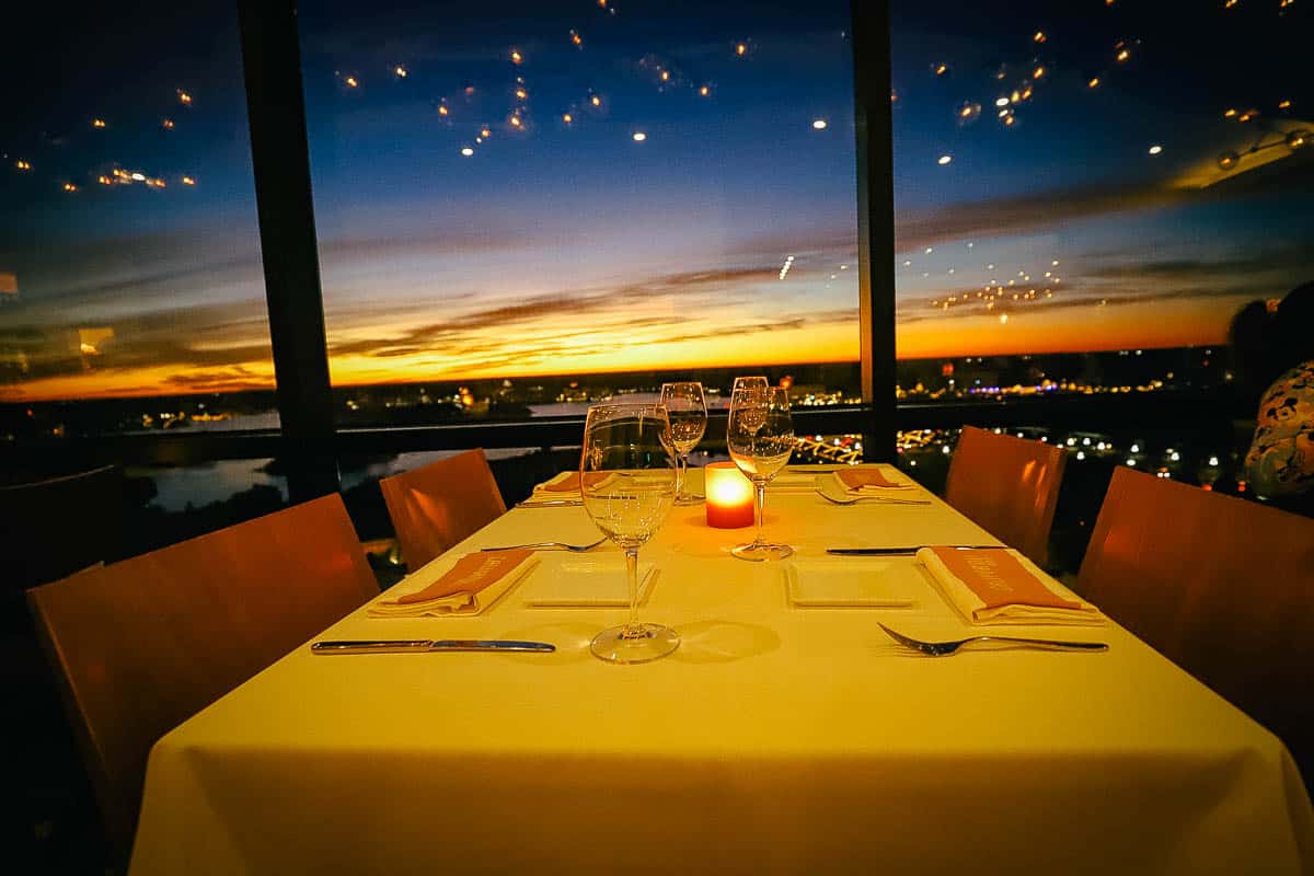a view of the sunset from a fine dining rooftop restaurant at Disney World 