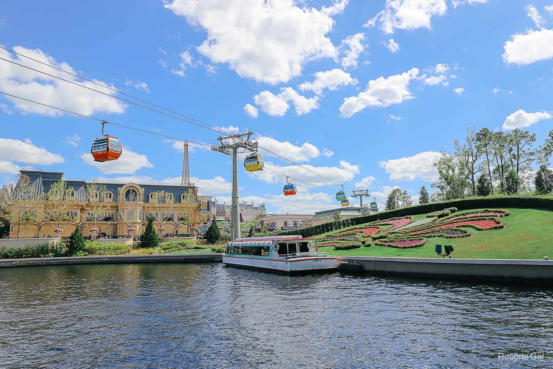 the Skyliner as it comes or leaves Epcot traveling over the France Pavilion 