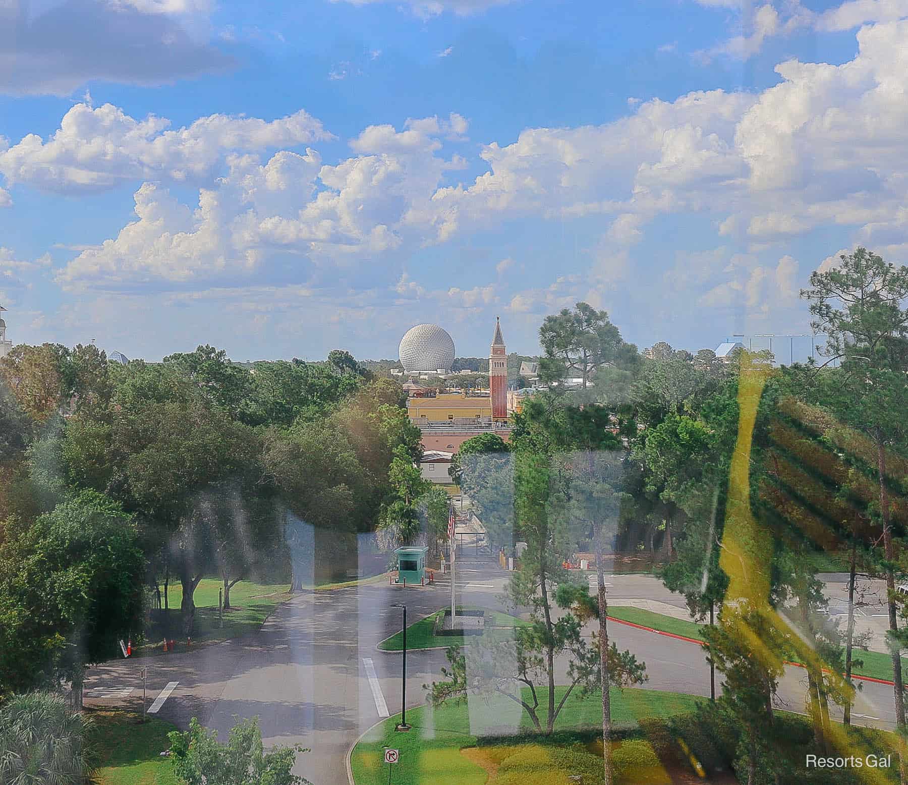 a view of Spaceship Earth and Epcot's Italy Pavilion from the Skyliner 