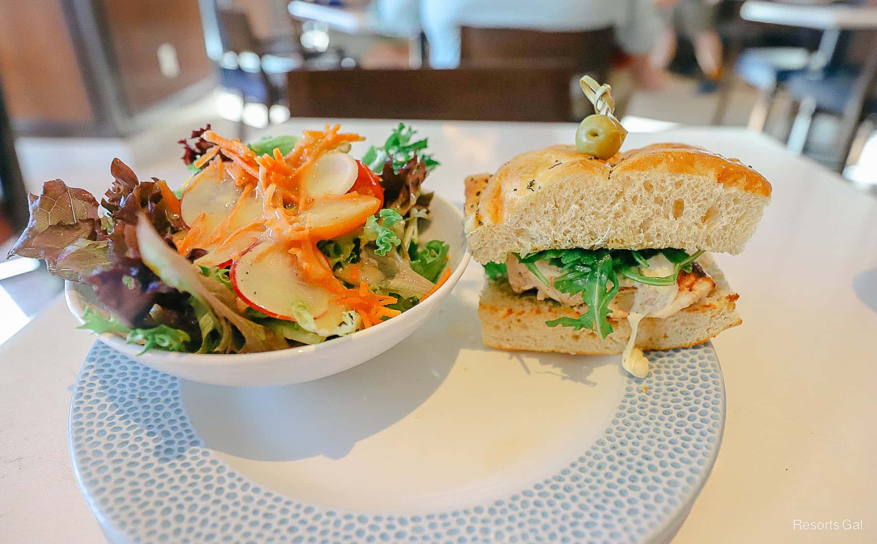 a salad with a sandwich from Primo Piatto 