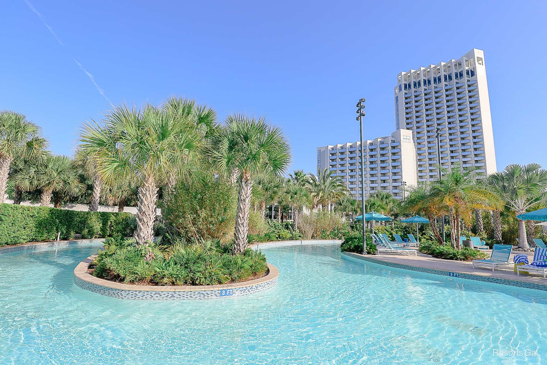 the pool with Hilton Buena Vista Palace at Disney Springs in the backdrop 