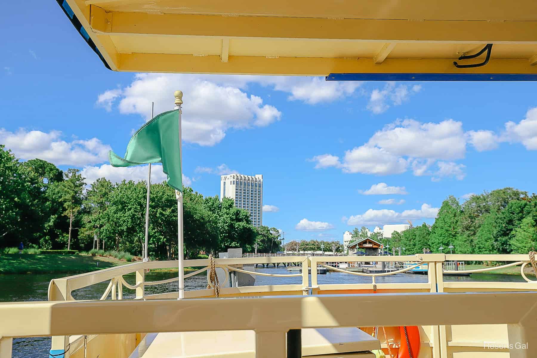 a green flag water taxis traveling to Disney Springs 