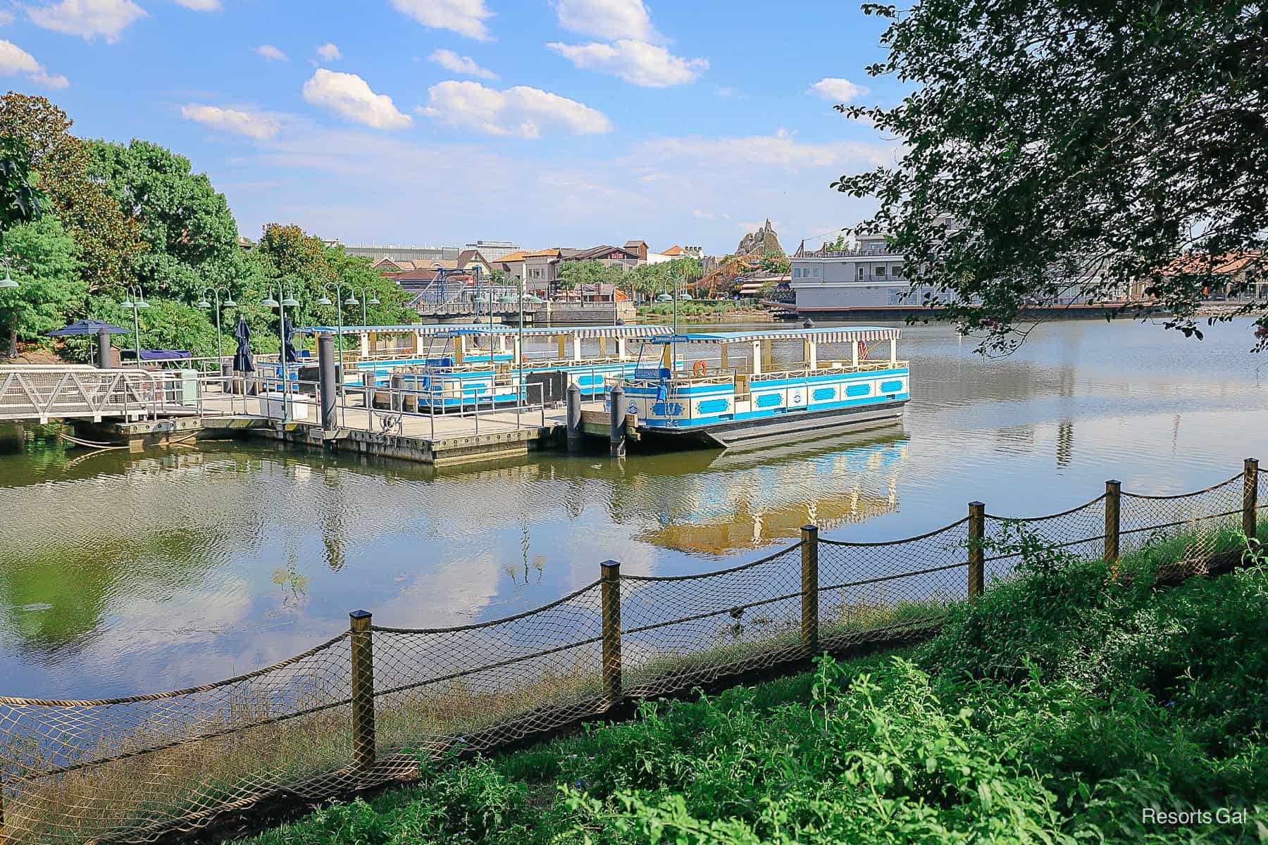 the Marketplace dock at Disney Springs with multiple boats docked 