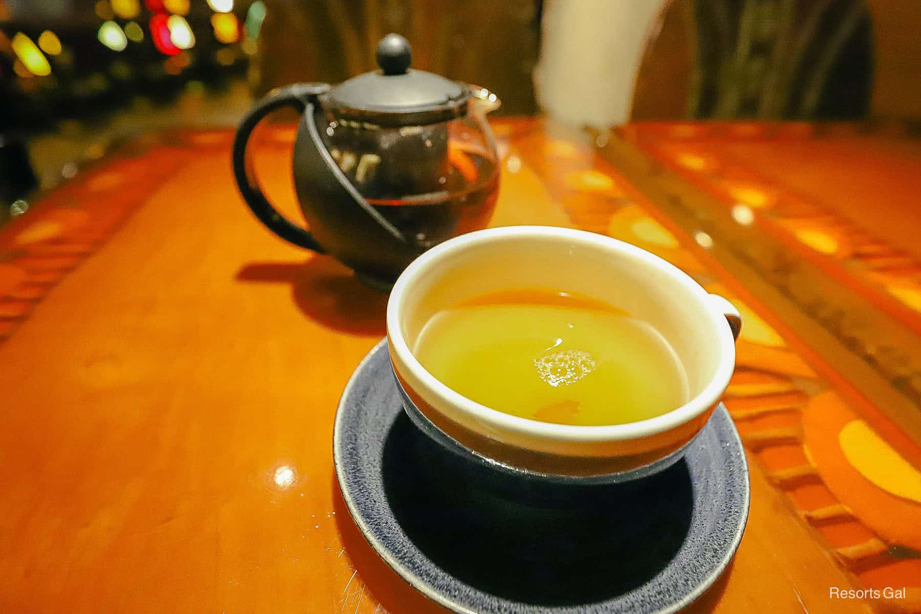 a teapot and a teacup at a table service restaurant at Disney Resorts 