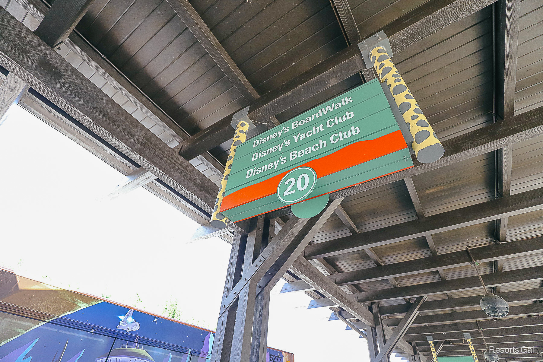 a sign at a shared bus stop at Animal Kingdom for Beach Club, Yacht Club and Boardwalk 