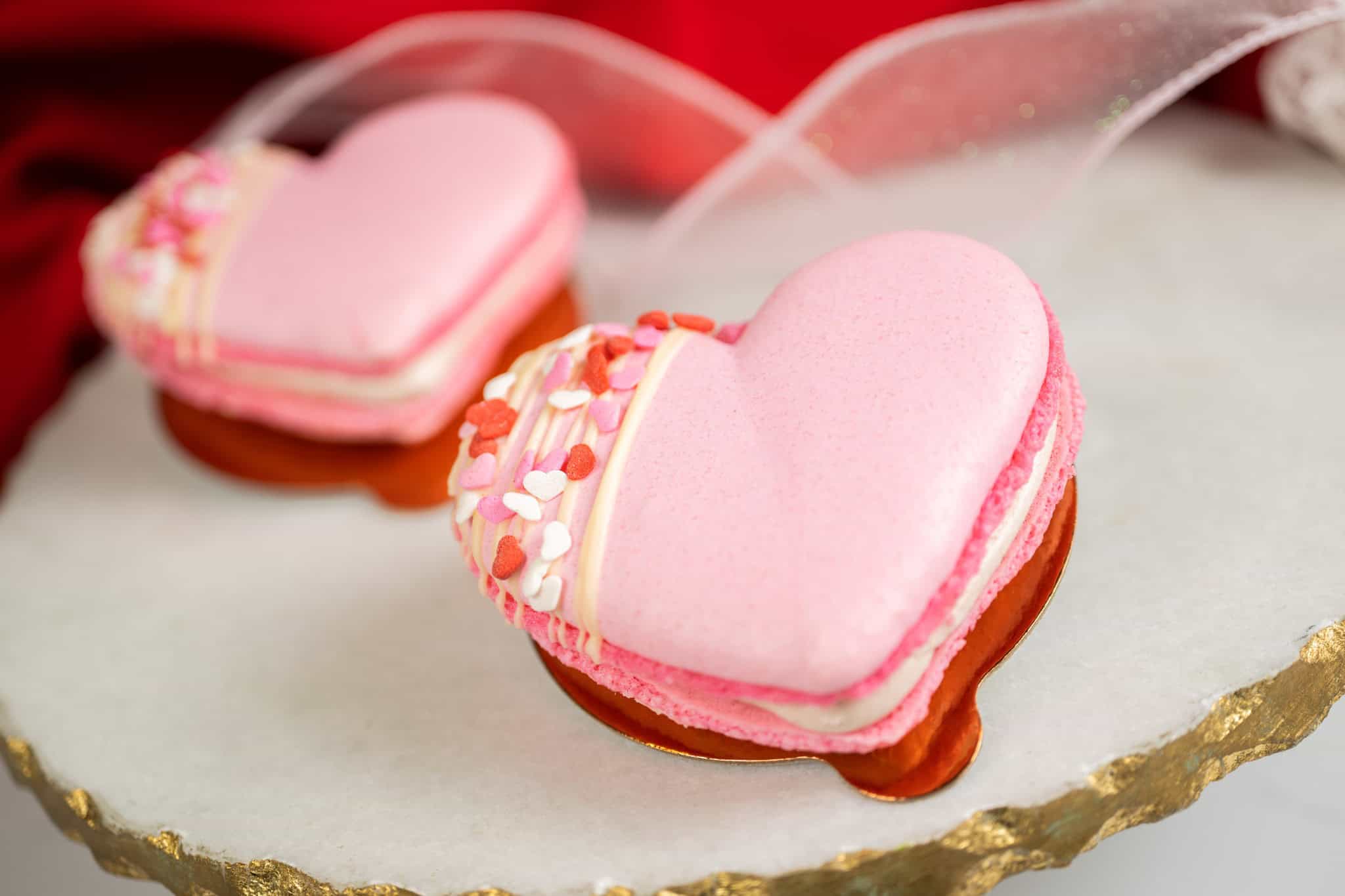 two heart shaped macarons