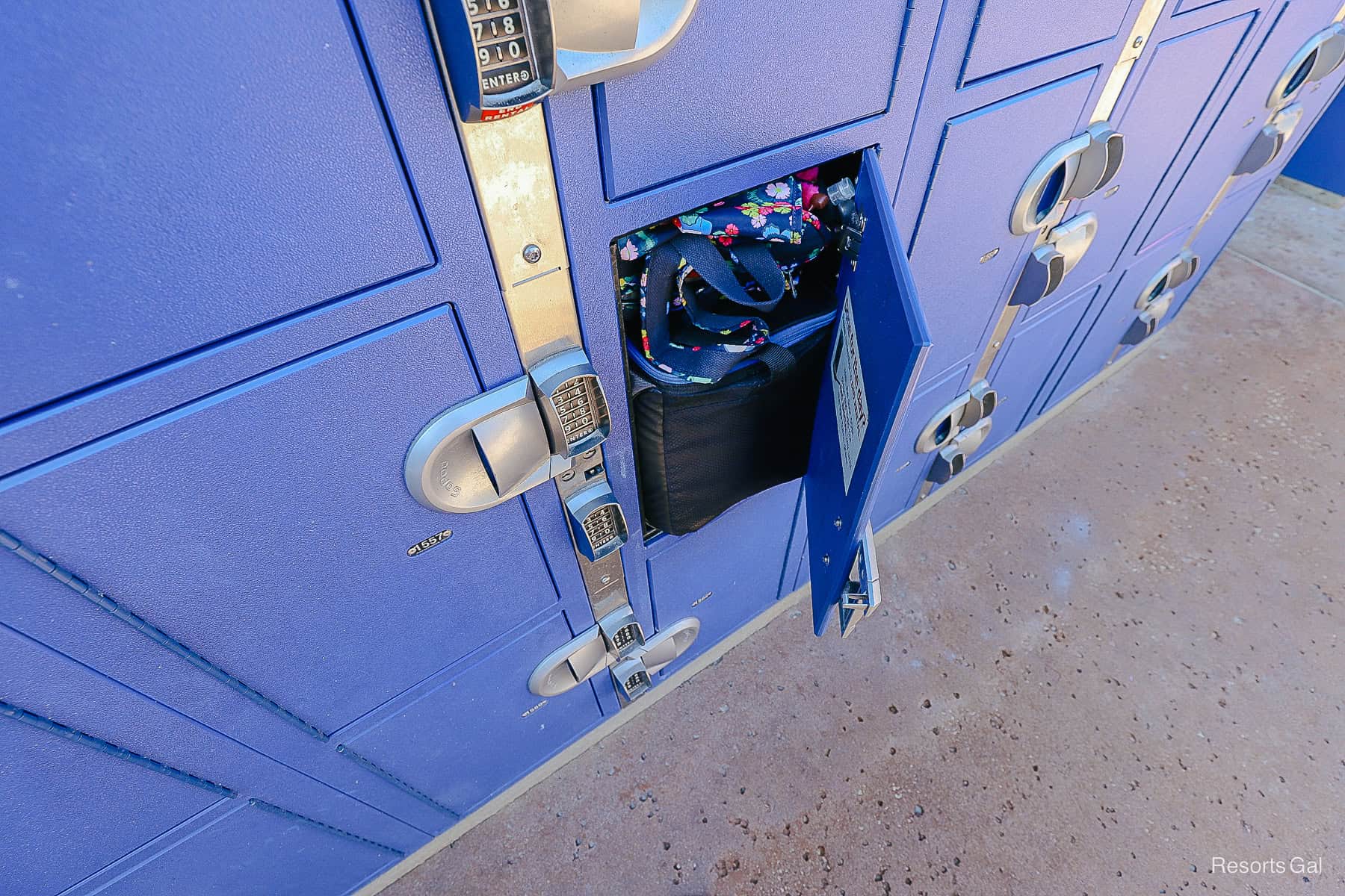 shows a cooler and a backpack in a large size locker at Typhoon Lagoon 