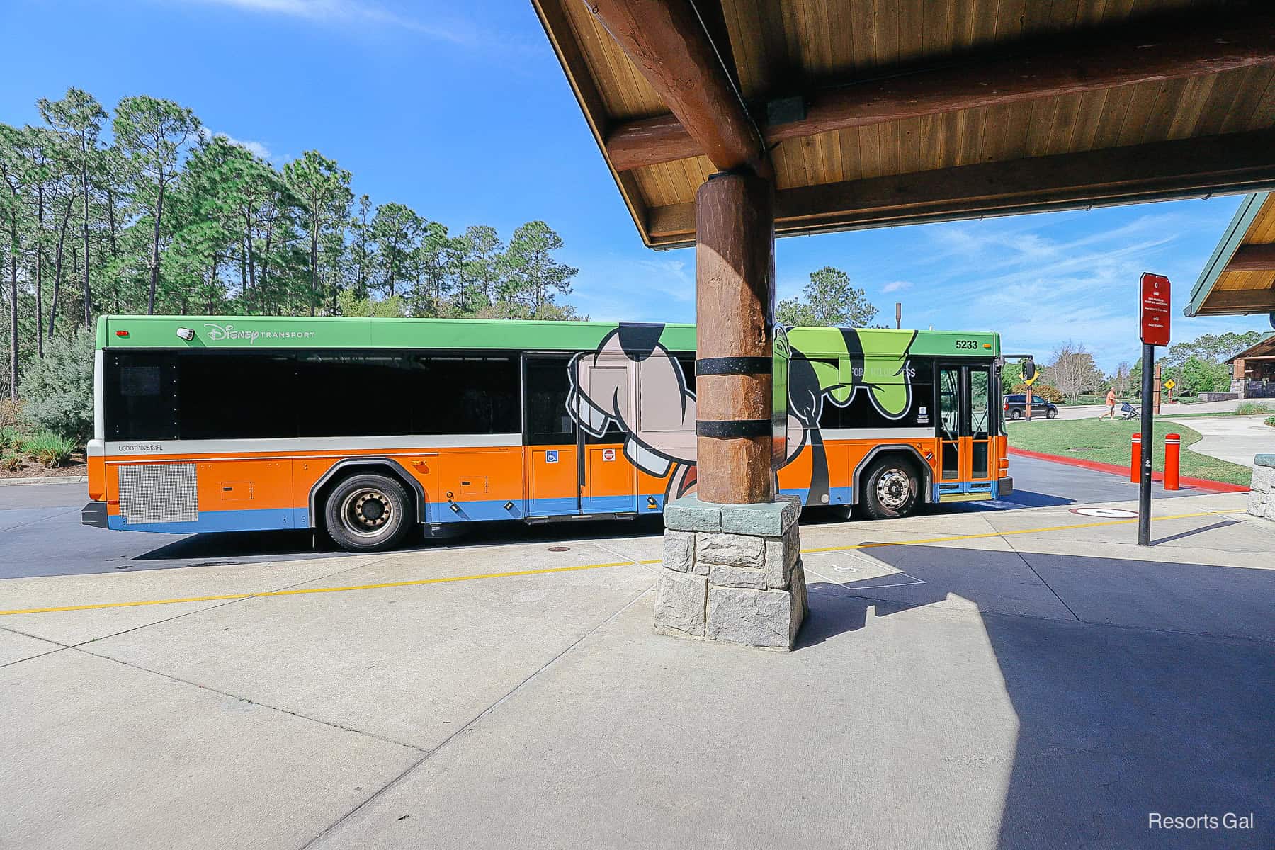 a bus stop at Disney's Wilderness Lodge with a Goofy bus 