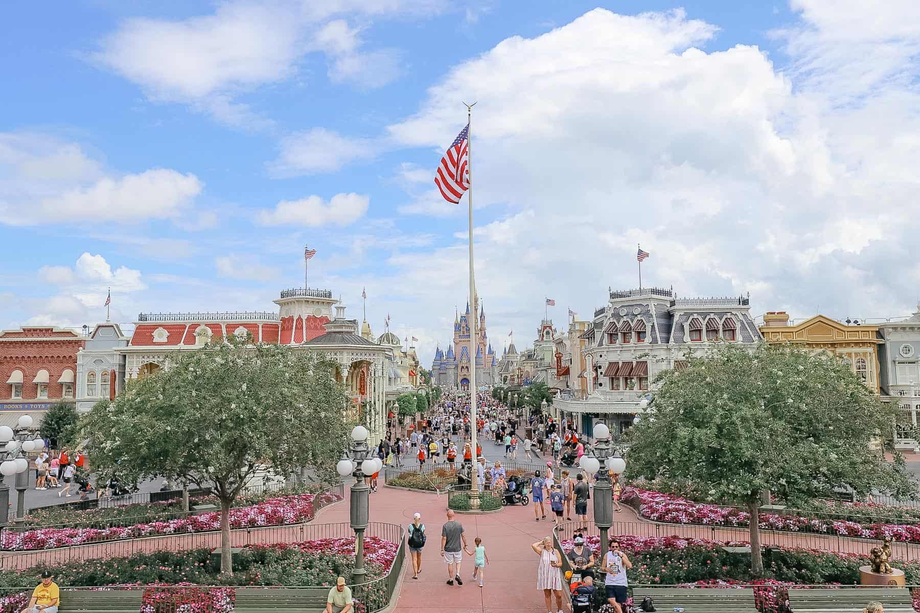 Main Street at Magic Kingdom with flag at Town Square 