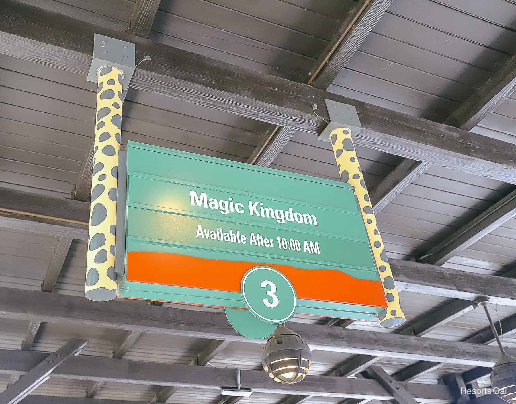 a sign for the Magic Kingdom bus stop at Disney's Animal Kingdom. It says the bus is available after 10:00 a.m. 