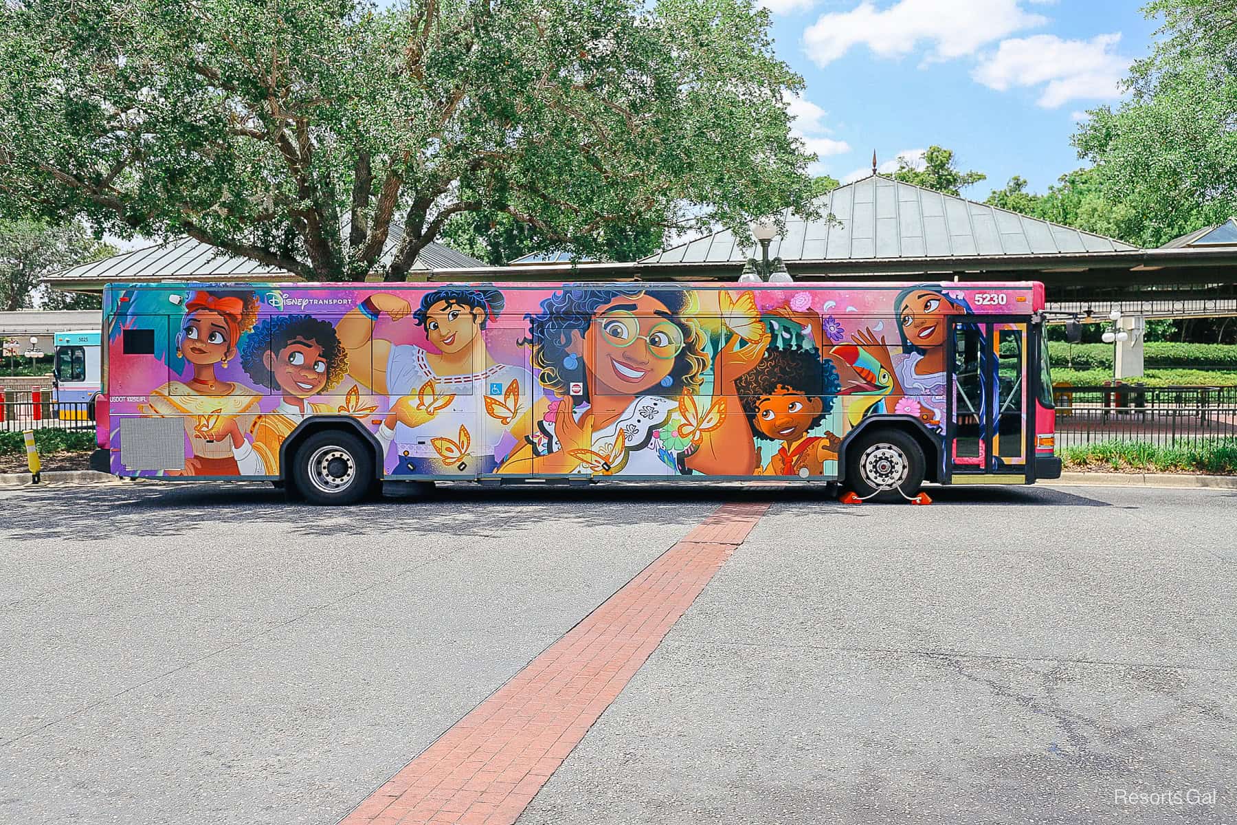 an Encanto bus wrap at Disney World 