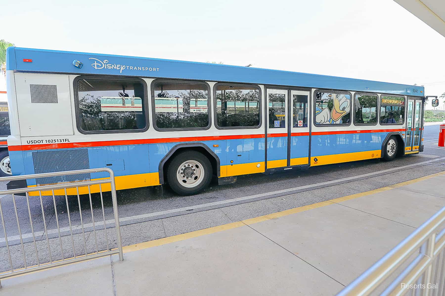 an older bus themed to look like Donald Duck 