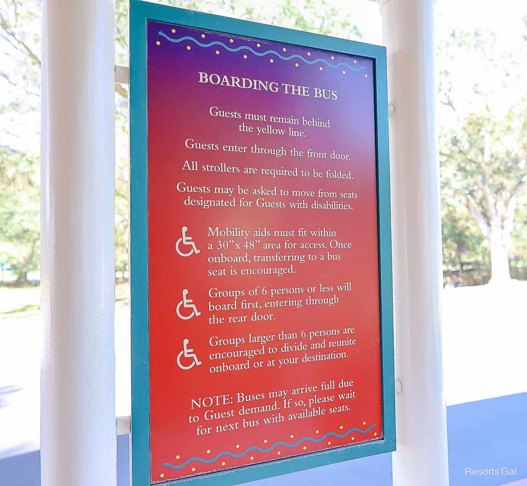 a list of rules posted at a Walt Disney World Resort bus stop 