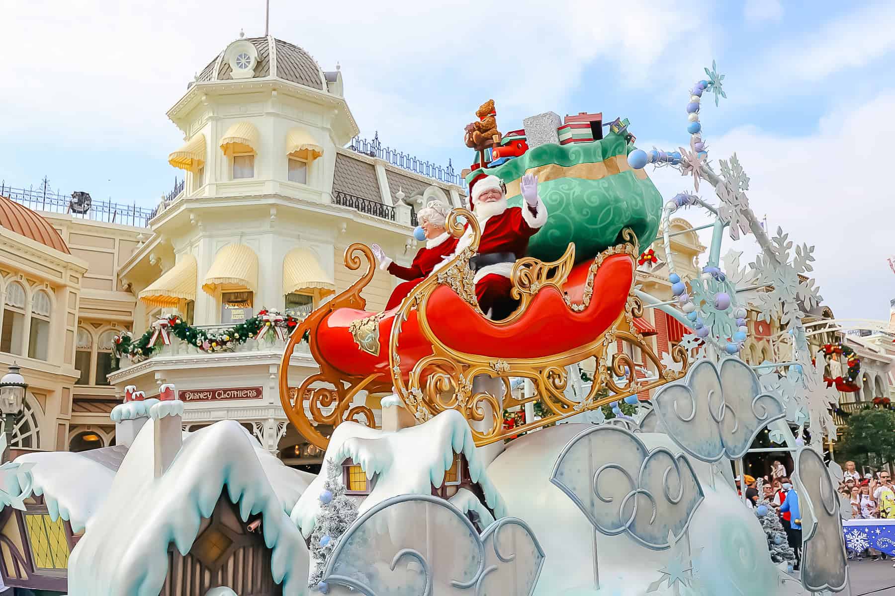 Santa and Mrs. Claus in the Christmas Parade during the week of Christmas at Magic Kingdom 