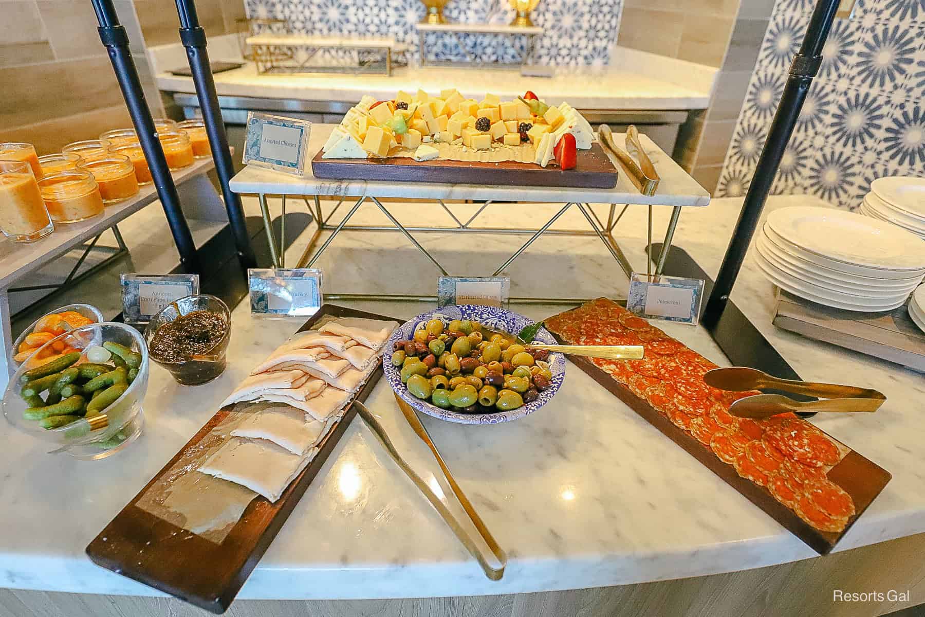 an evening spread of charcuterie and cheese at a club level lounge at Disney World 