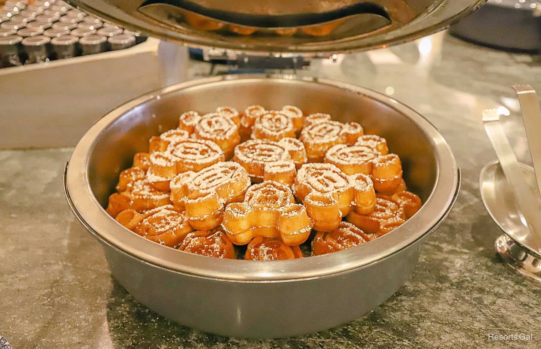 a vat of Mickey-shaped waffles 