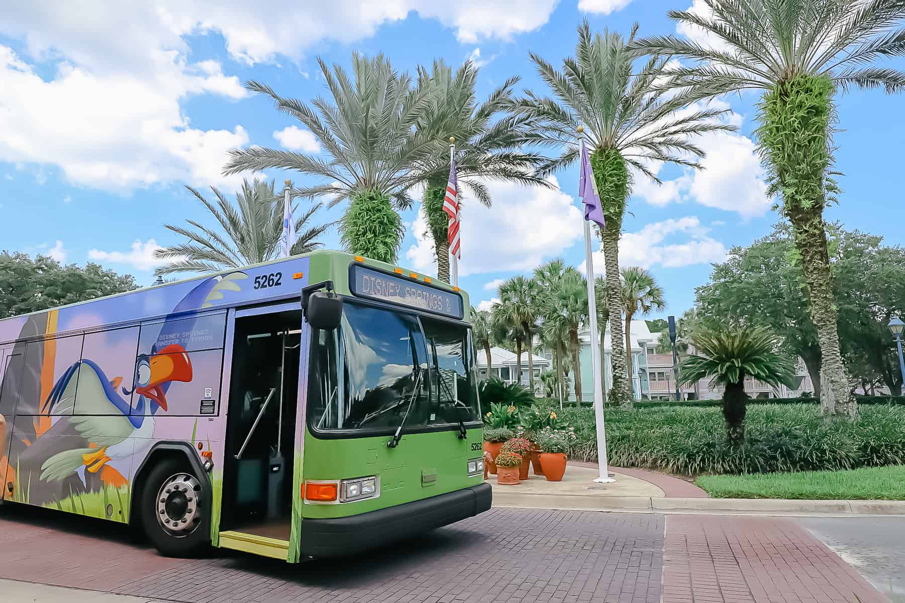 the bus stop at a Disney Resort with a Lion King themed bus 