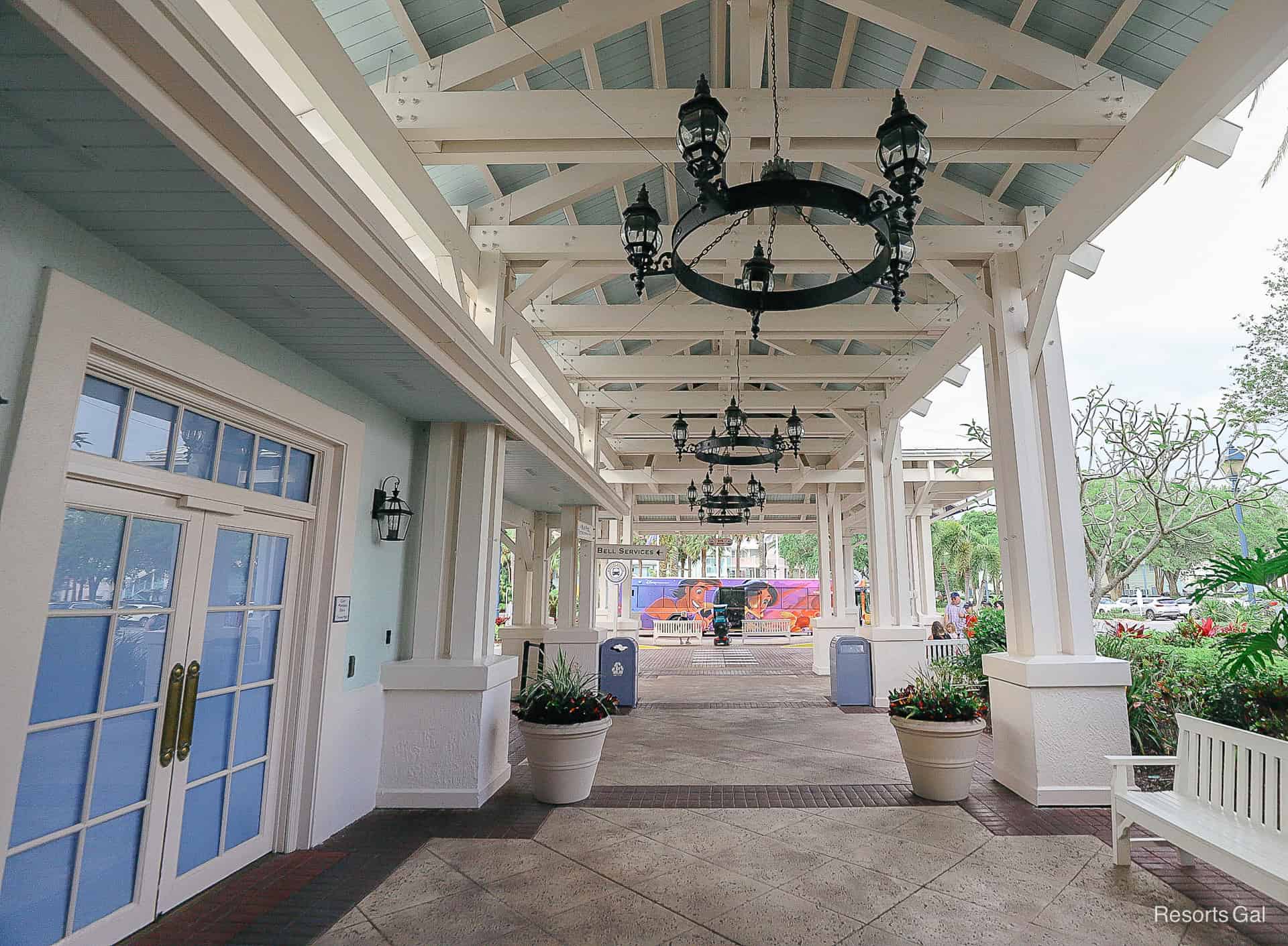 a walkway from the bus stop to Hospitality House that's partially covered 