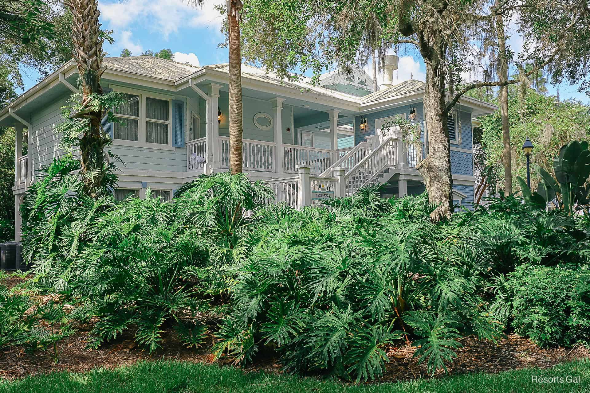 a building in Old Key West with an exterior staircase leading to the upper level 