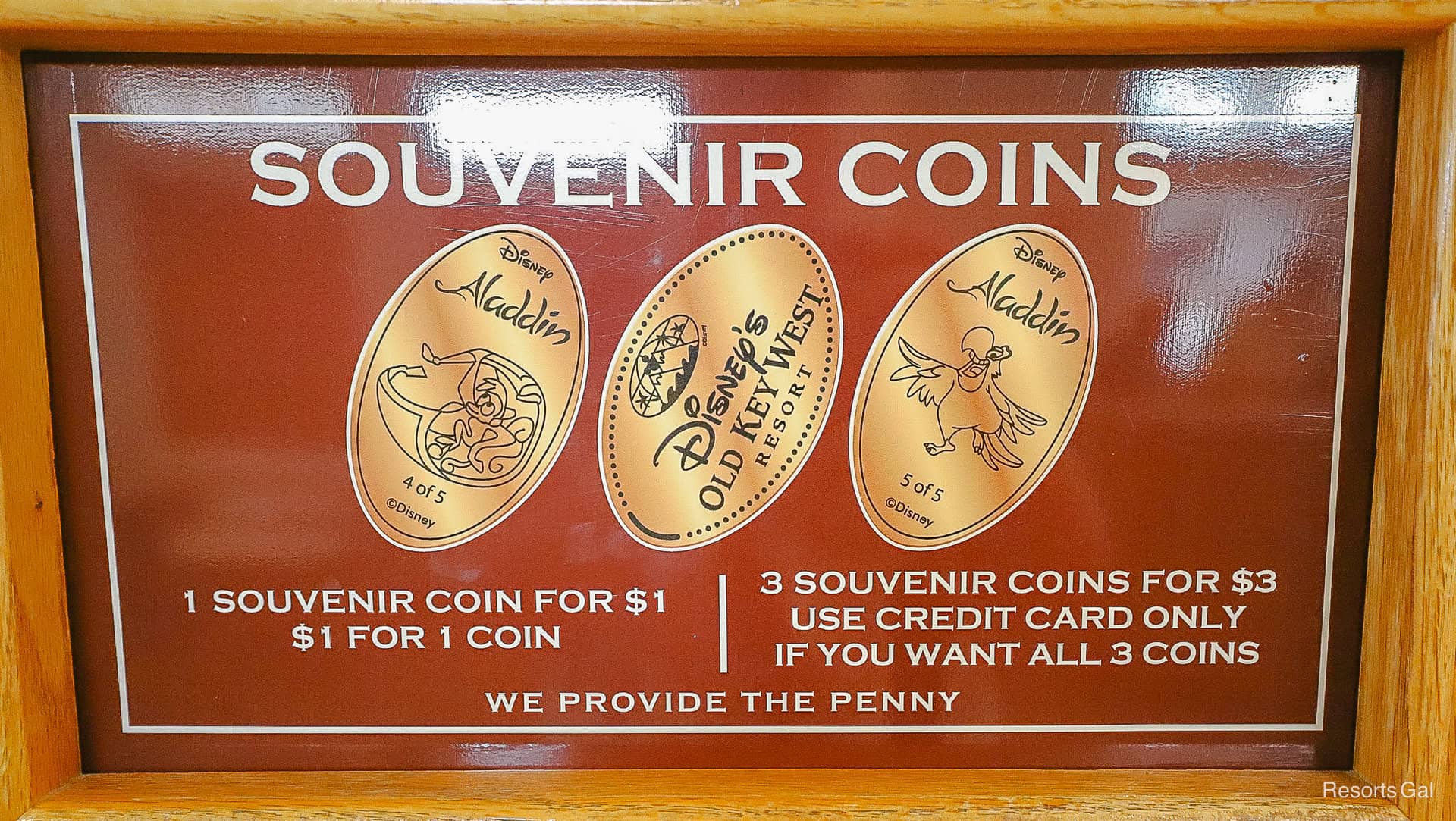 a display that shows the three kinds of Souvenir Coins available in the Pressed Penny Machine 