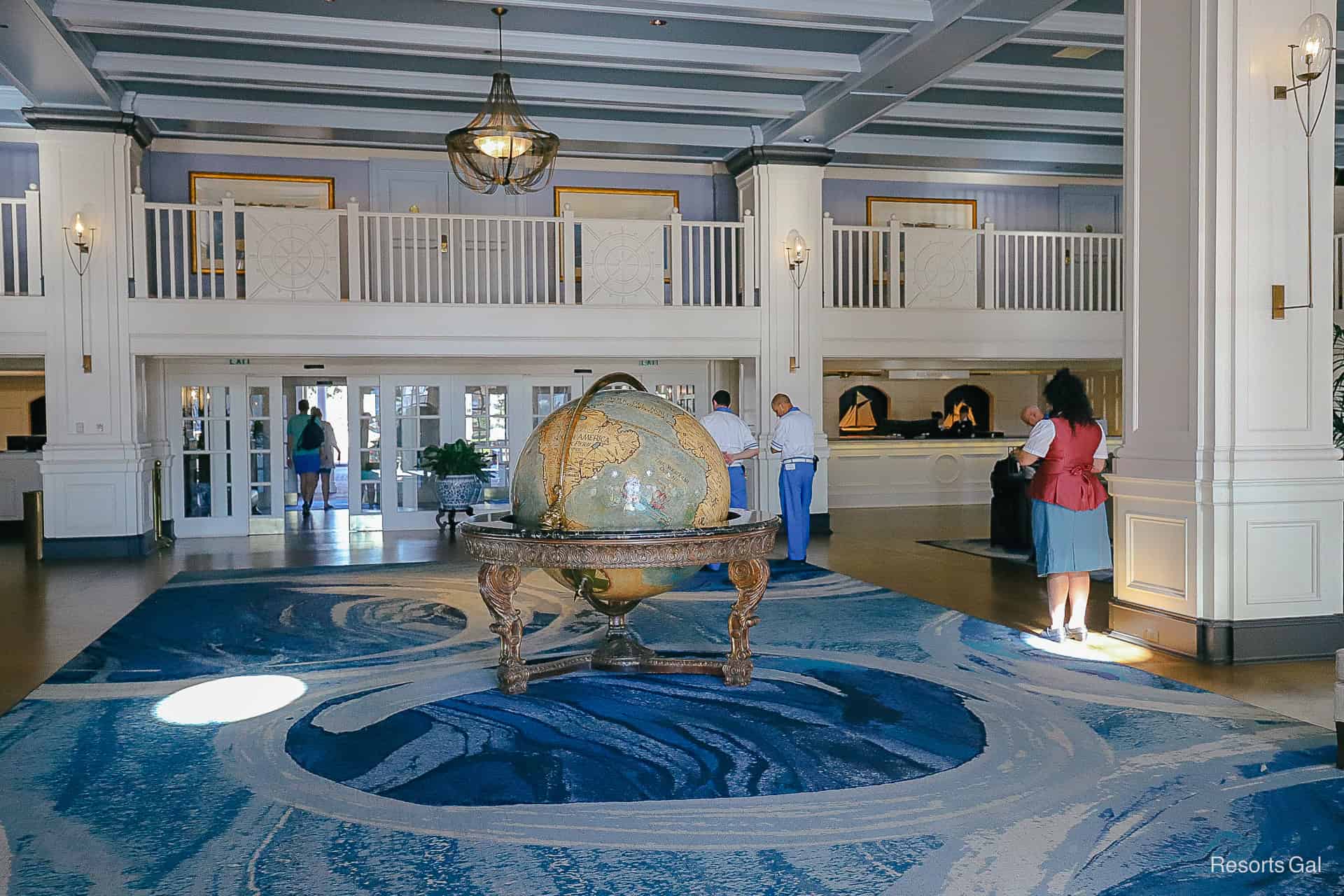 the globe as cast members wait to greet guests 