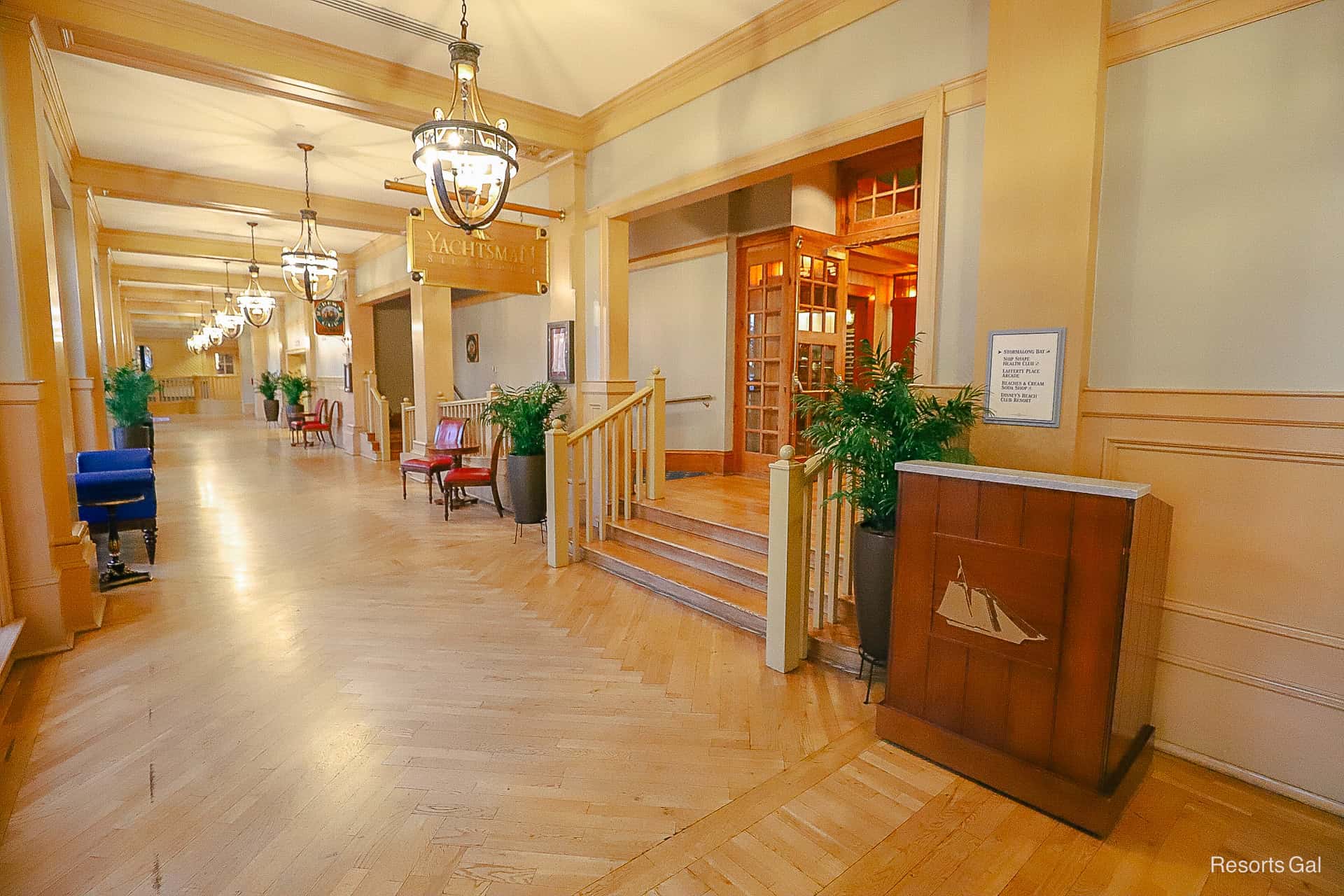 a hallway off the lobby that leads to dining 