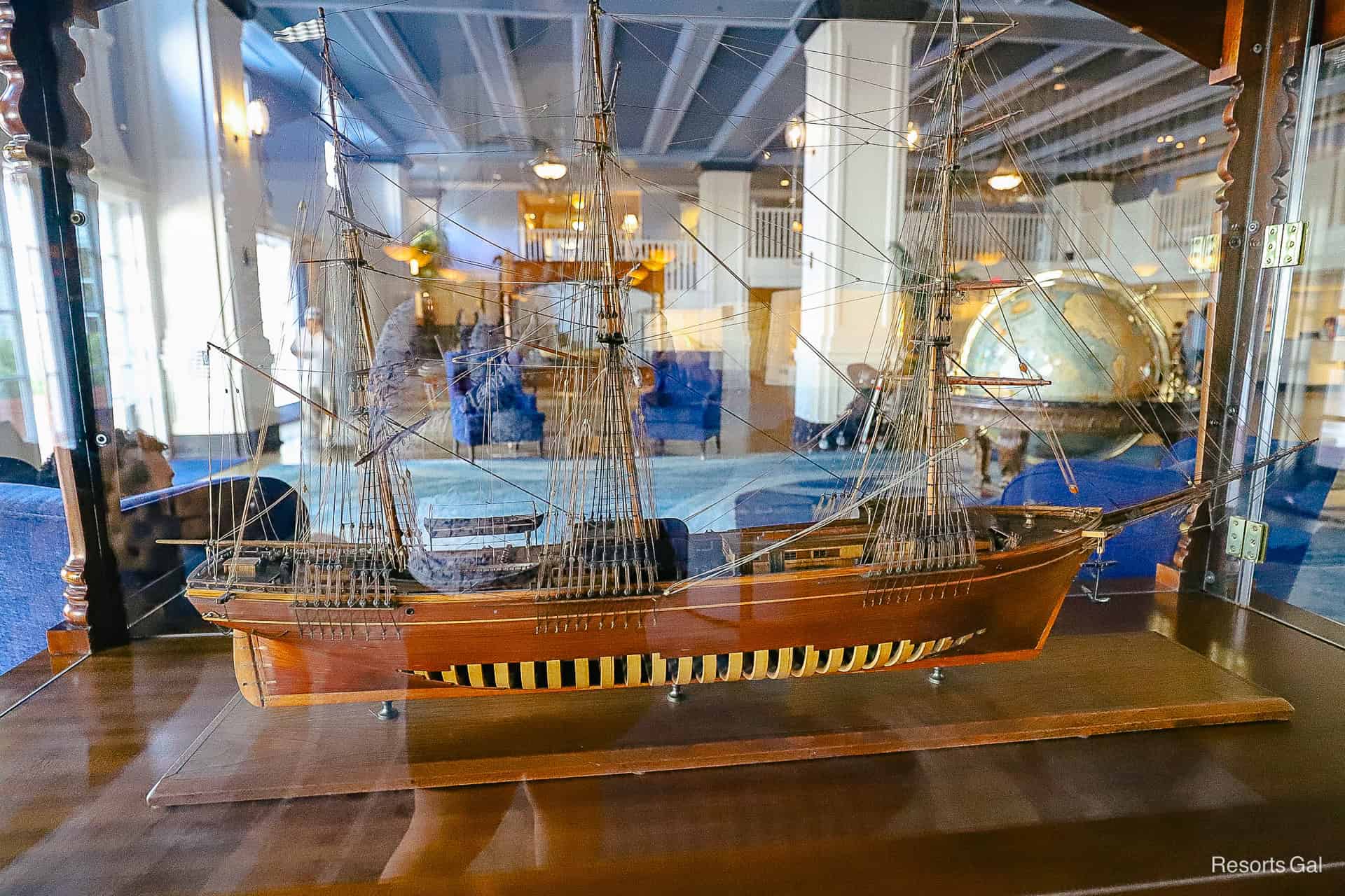 a closeup of a decorative ship in the Yacht Club's lobby 