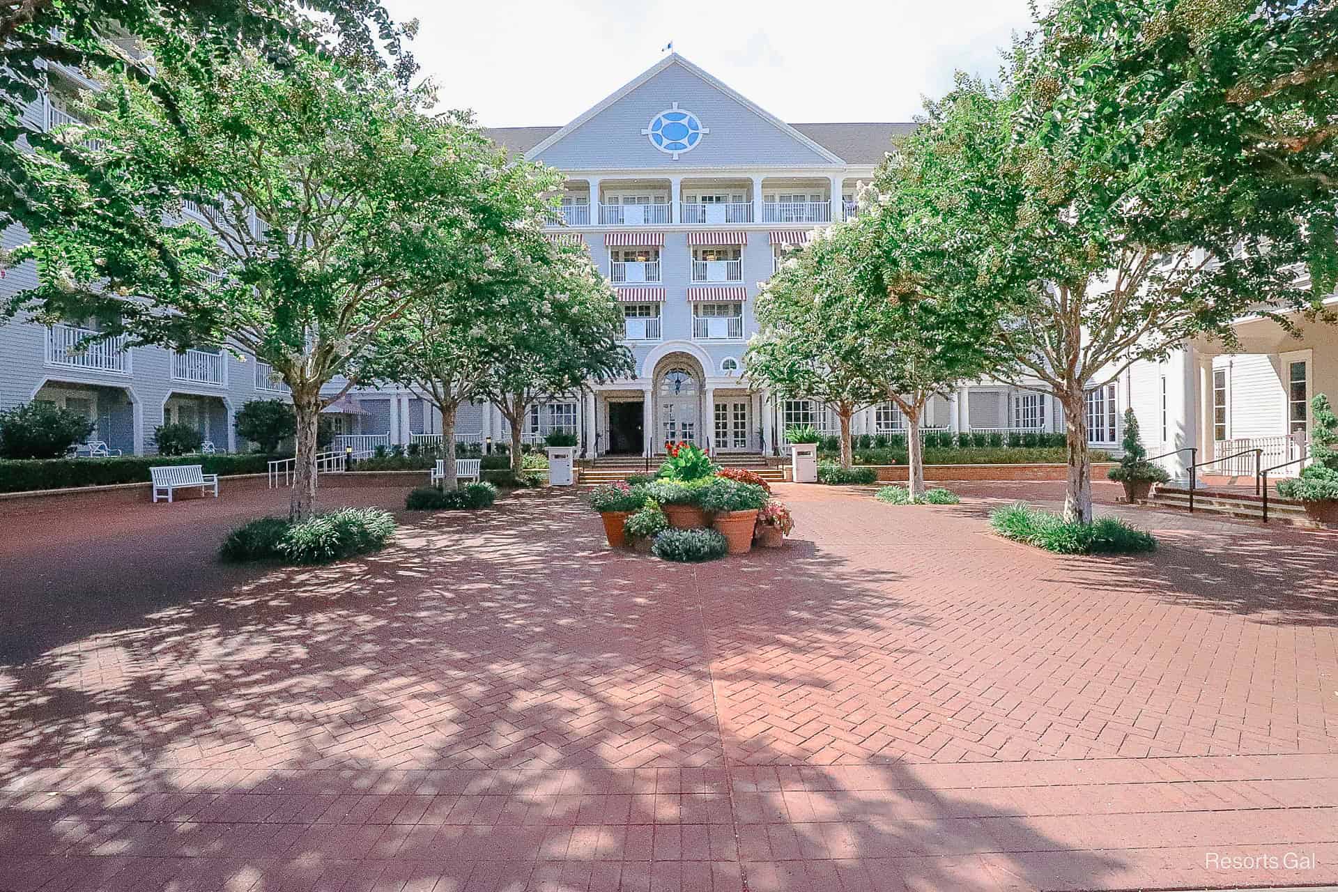 the courtyard in front of the resort side entrance of Disney's Yacht Club 