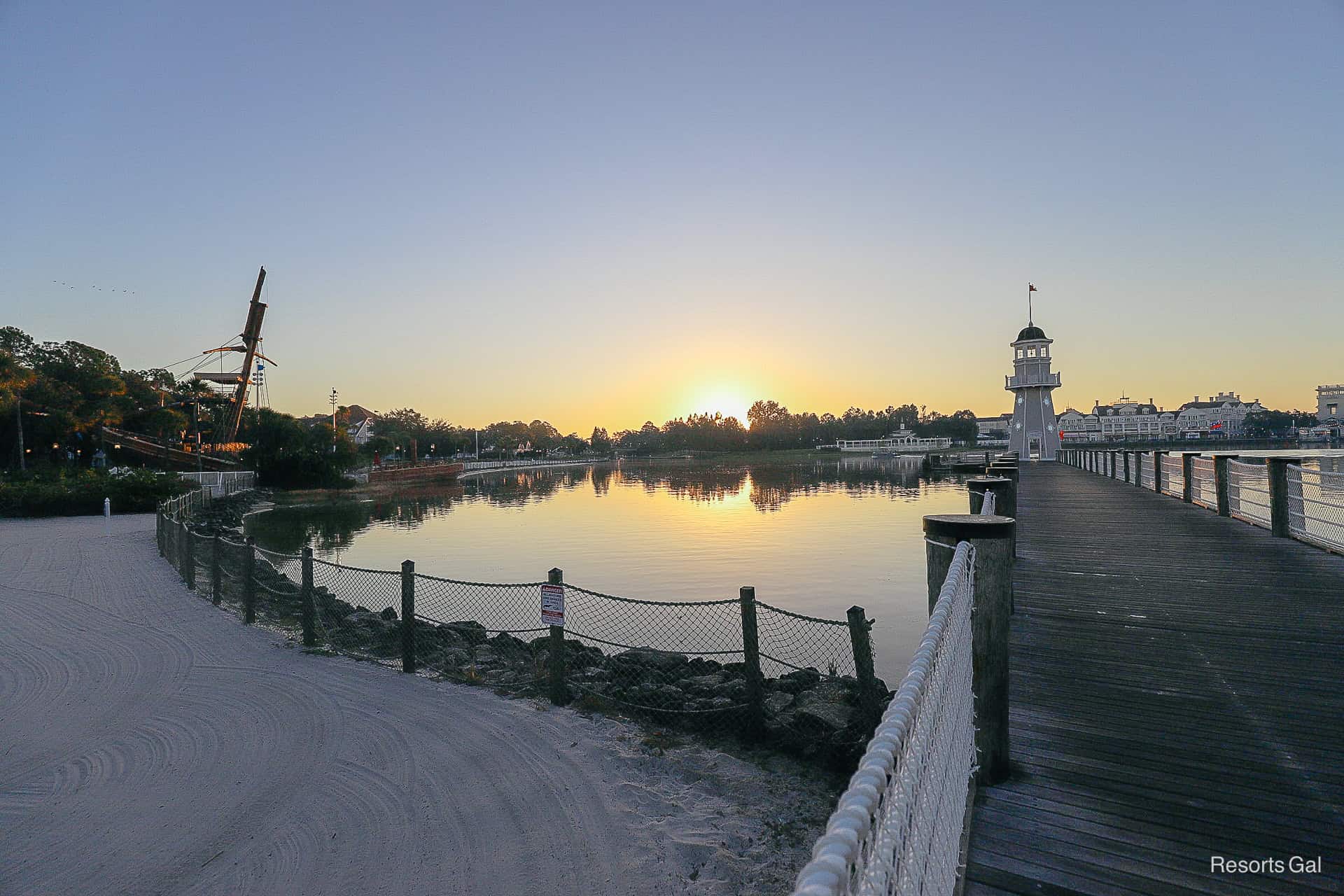 the sun rising over Epcot in the distance 