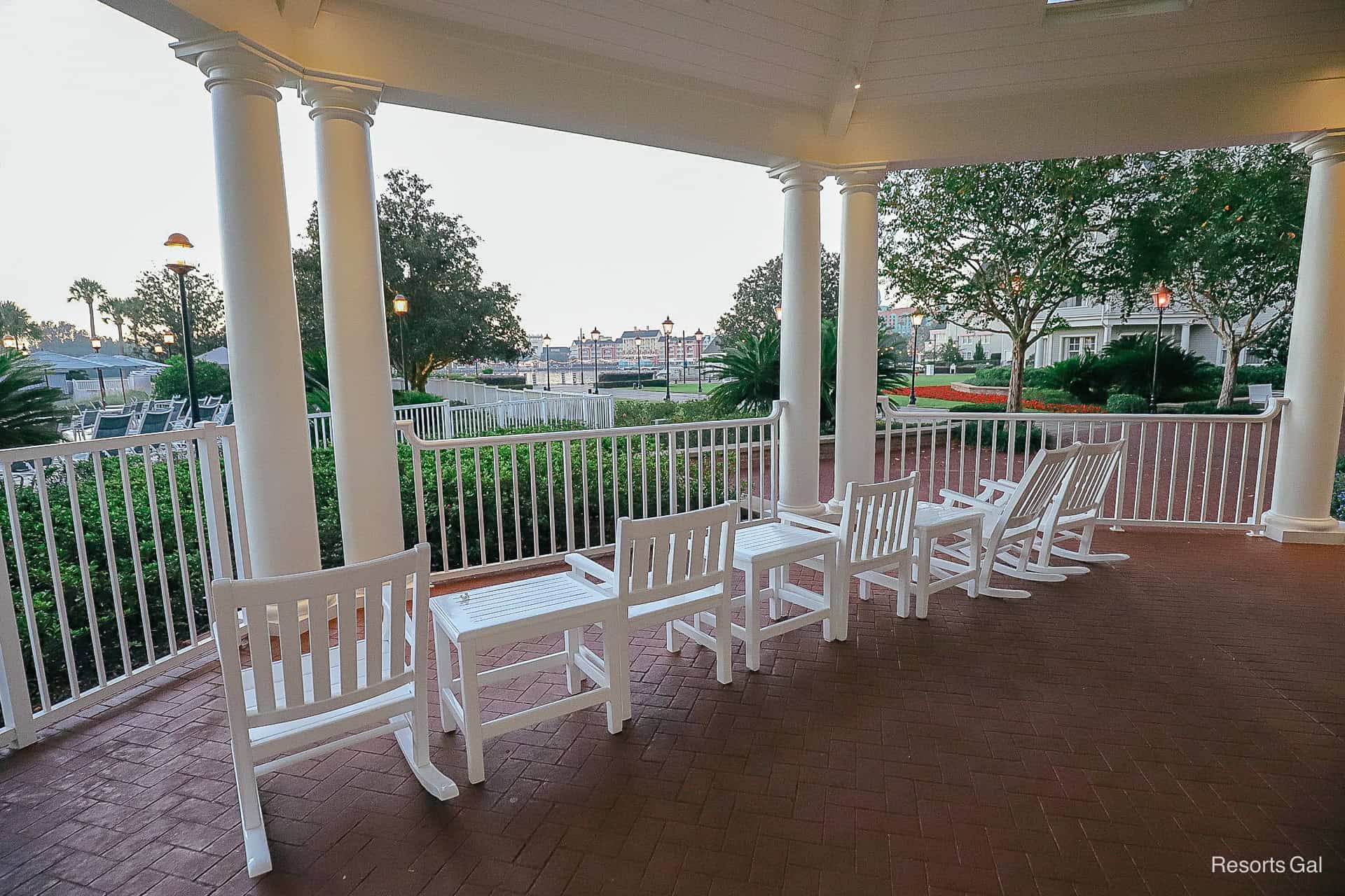 chairs and tables with rockers on the end and a view of the Boardwalk 