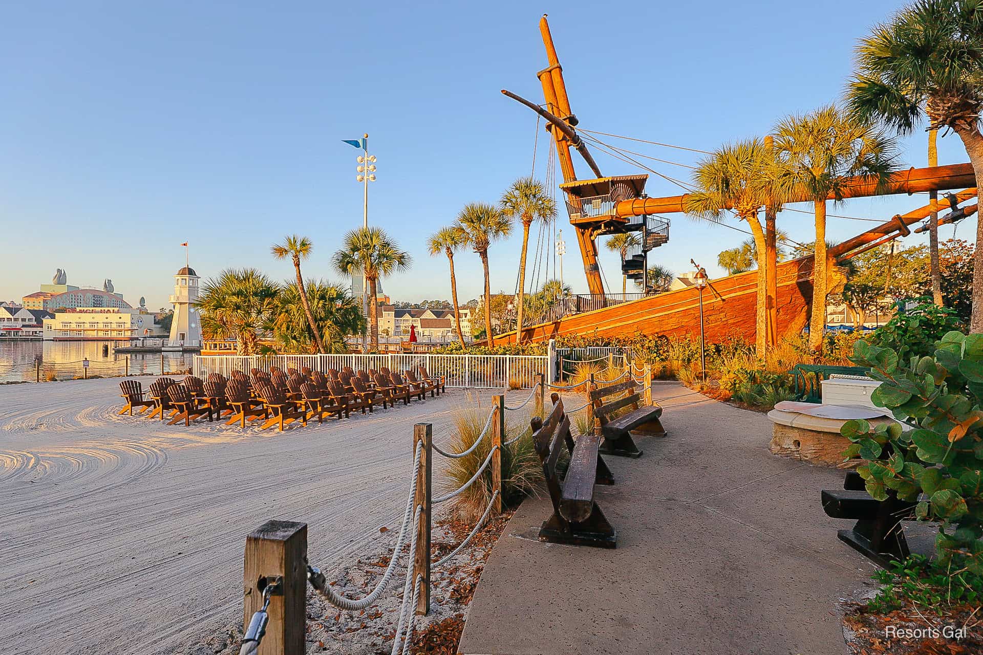 a view of the shipwreck and Adirondack chairs on the beach 