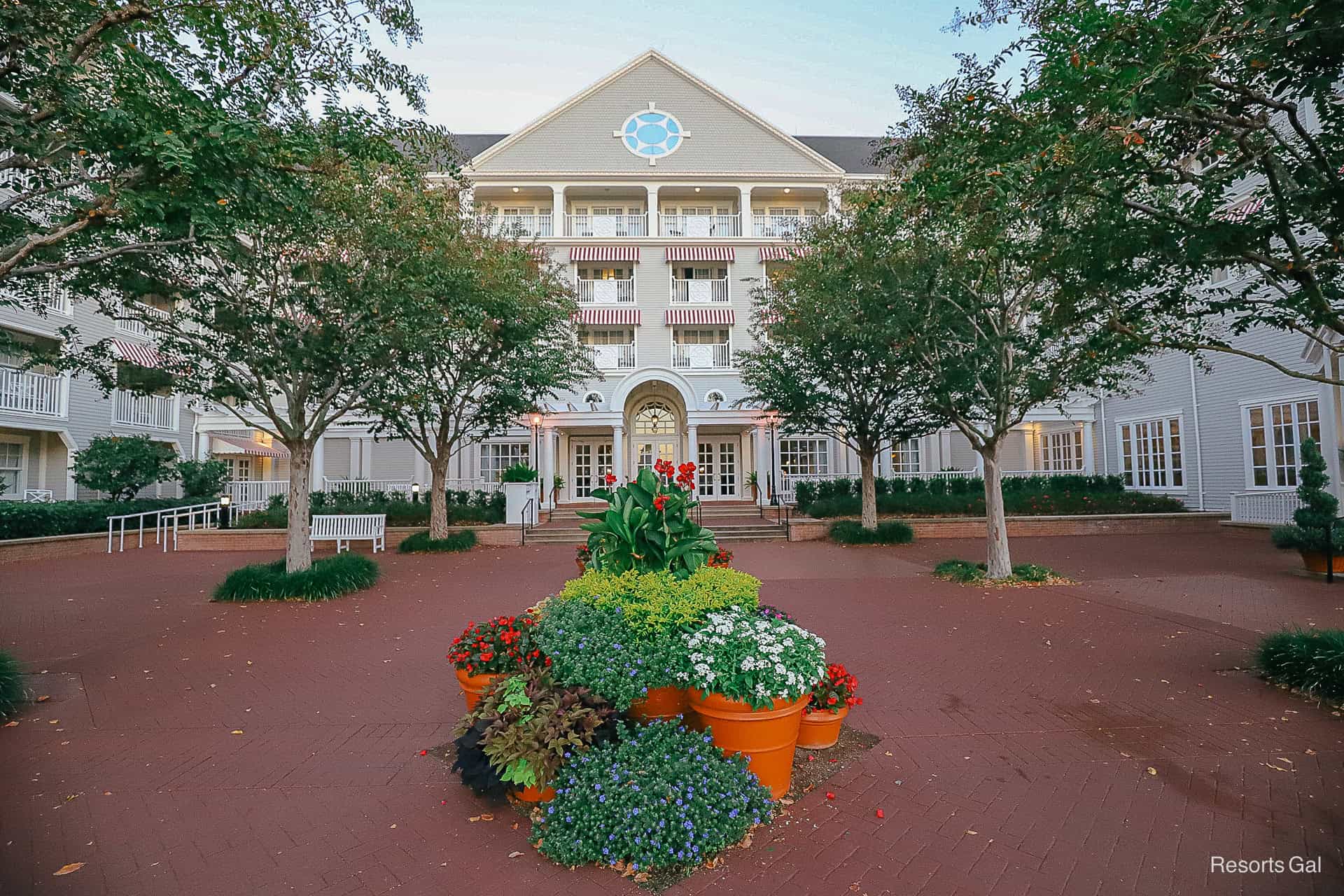 the resort's entrance glows at sunrise 