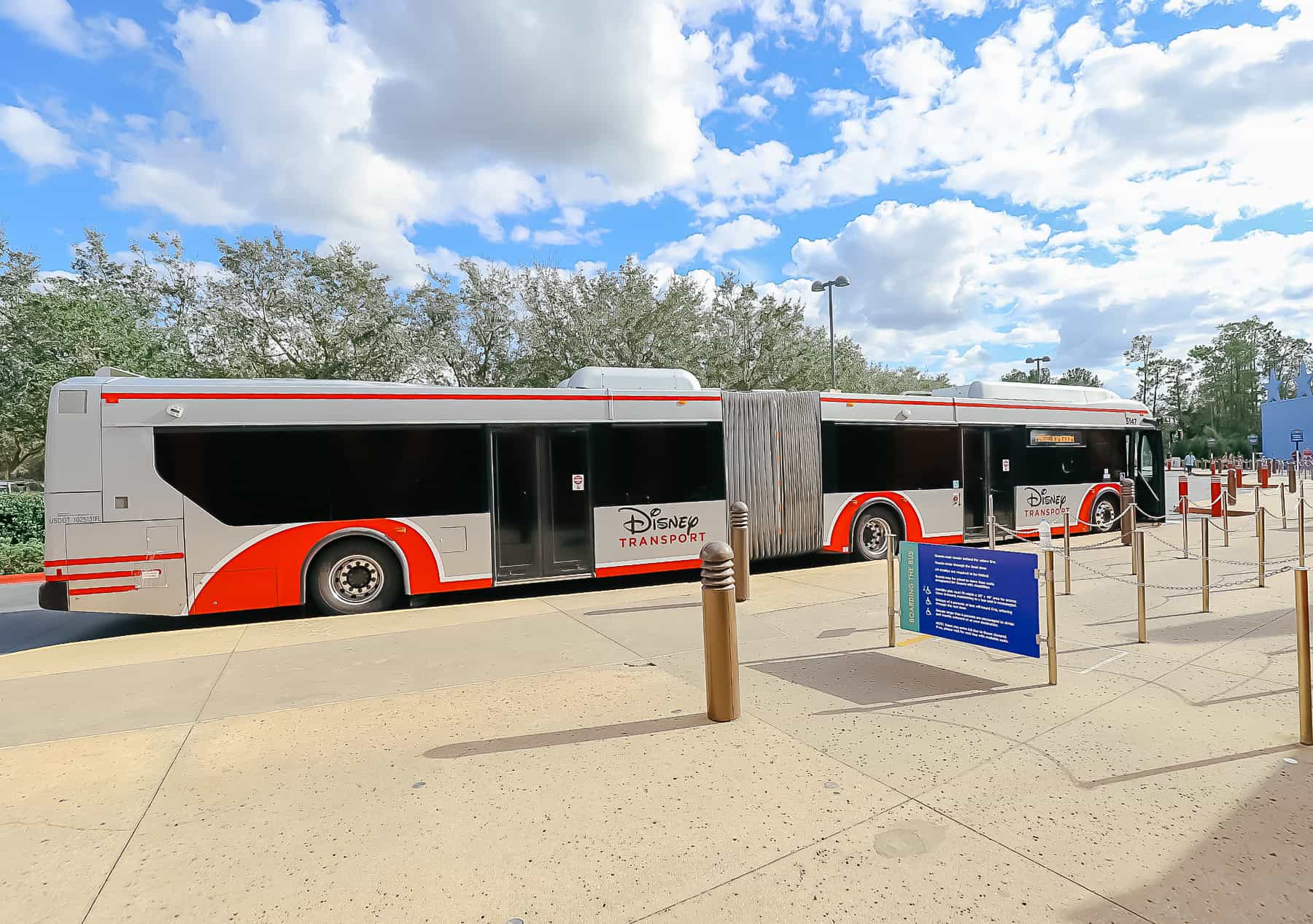 a double bus waiting to take guests to a park 