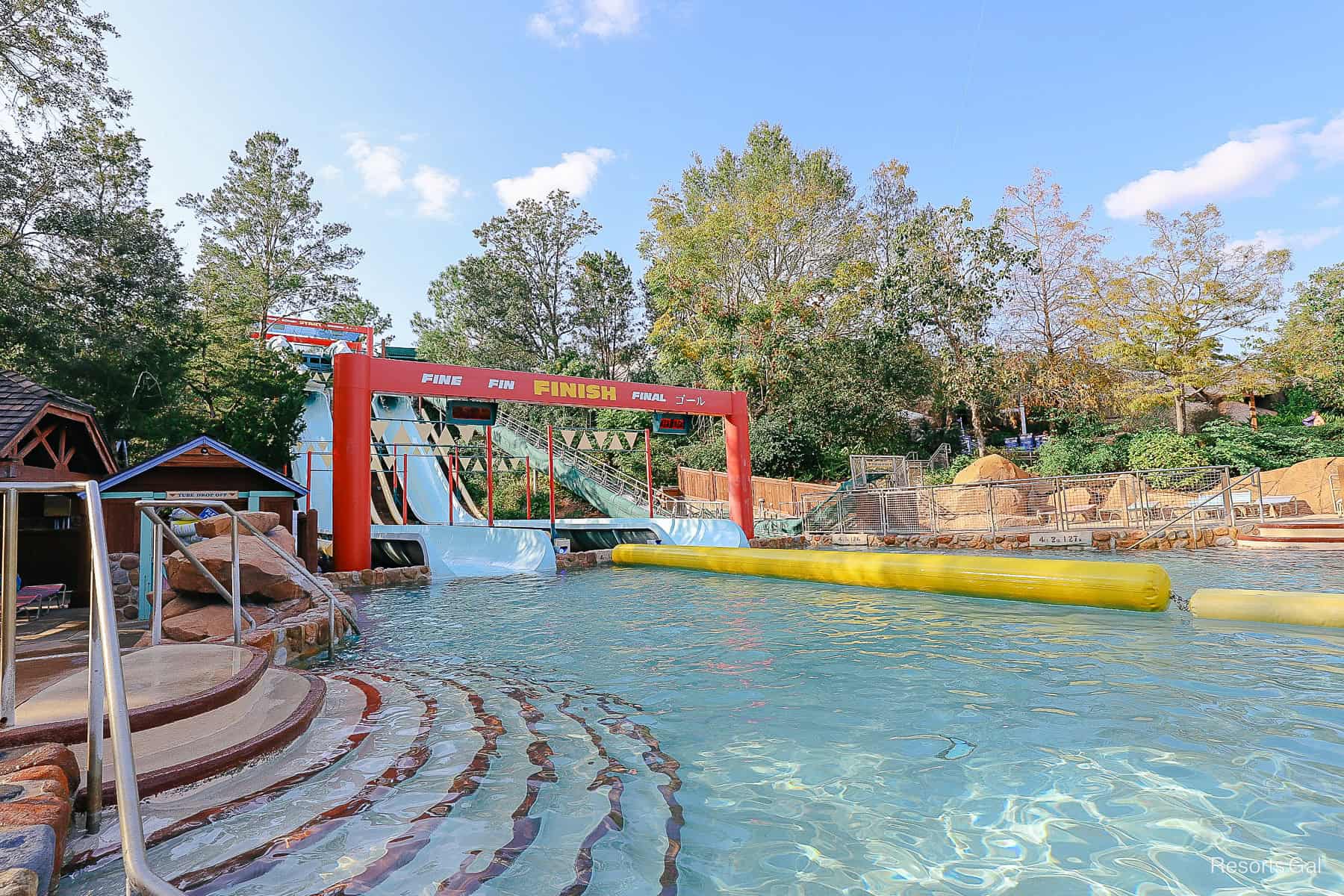 steps where guests climb out of the pool at the end of the slide 