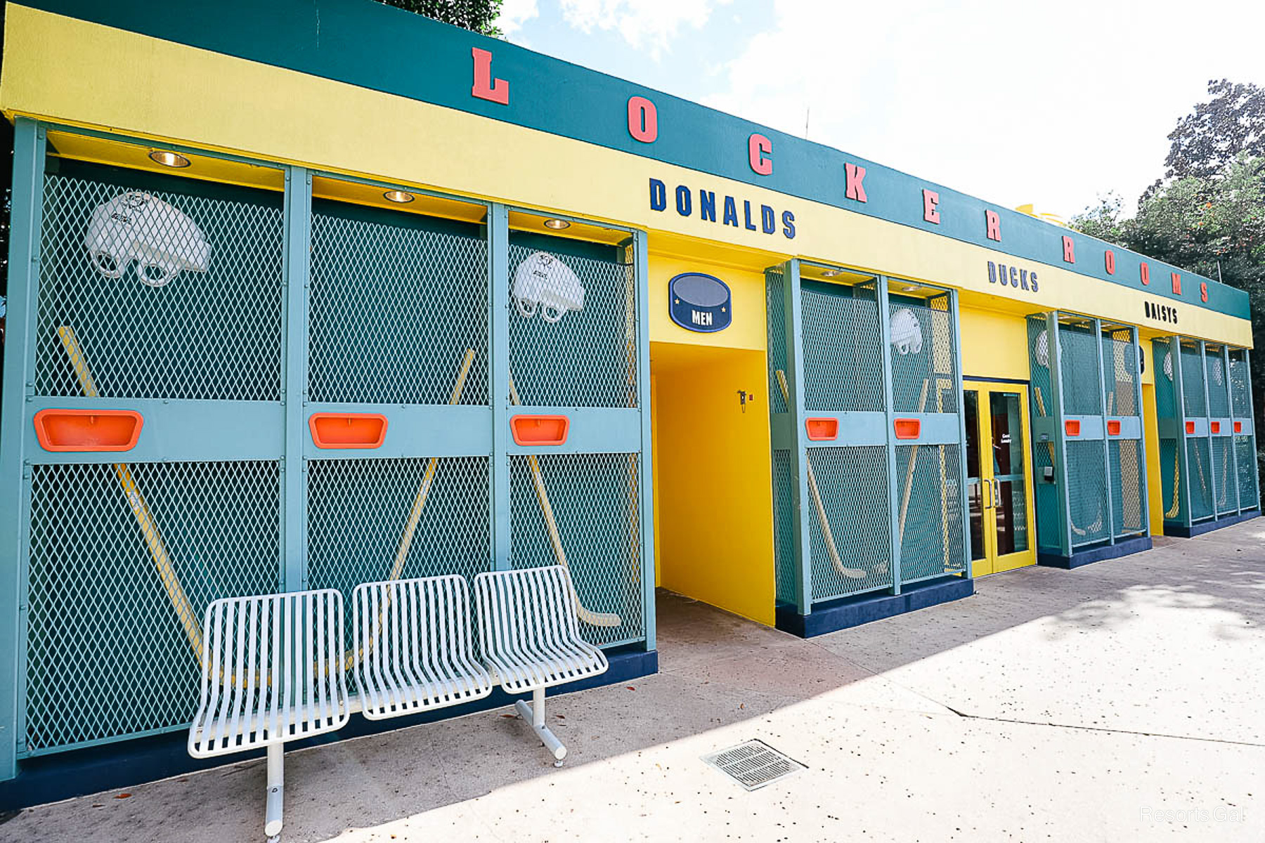 green and yellow building that's the Duck Pond Pool Laundry room 