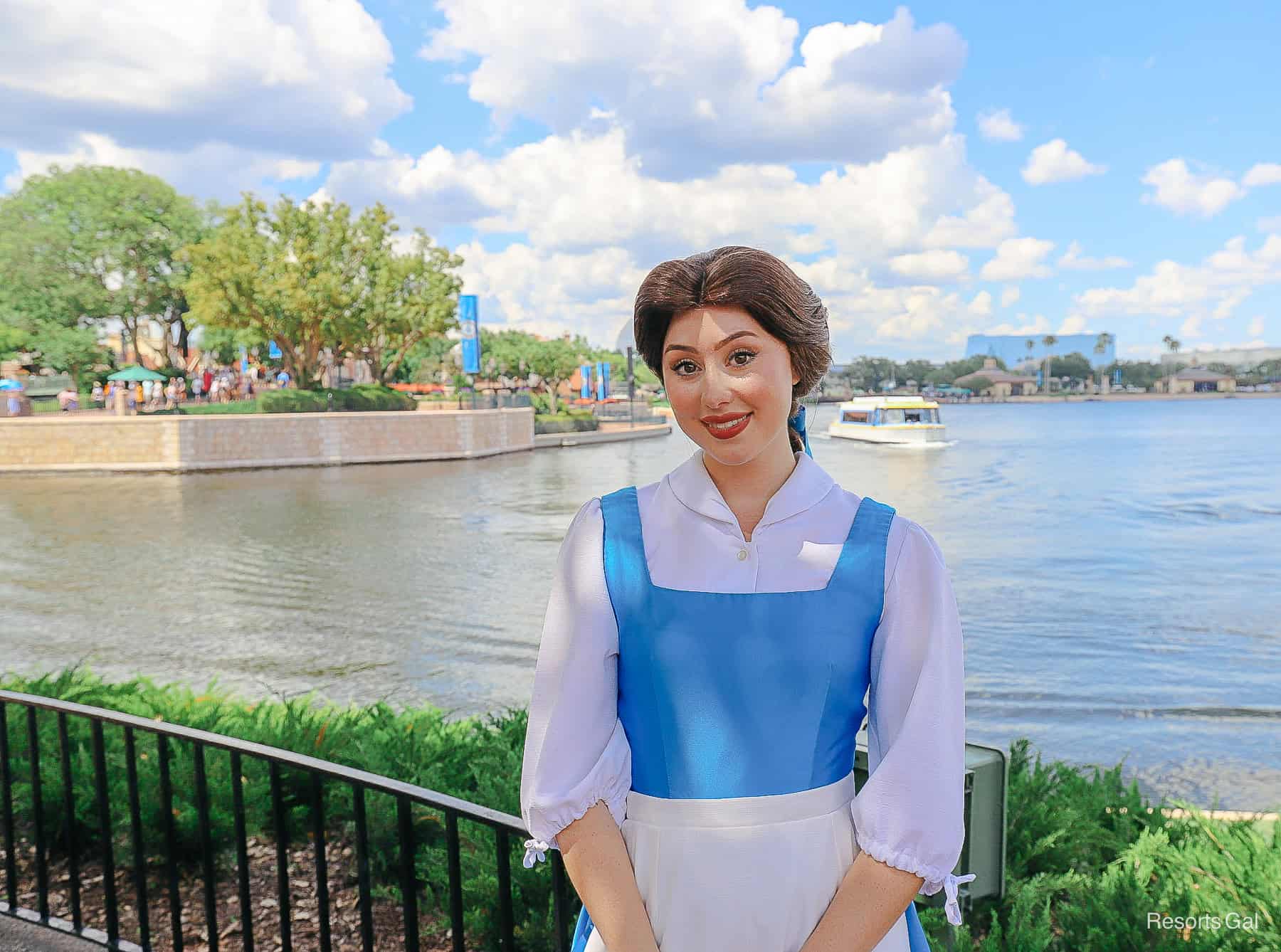 Belle in her village dress (blue and white) at Epcot's France Pavilion. 