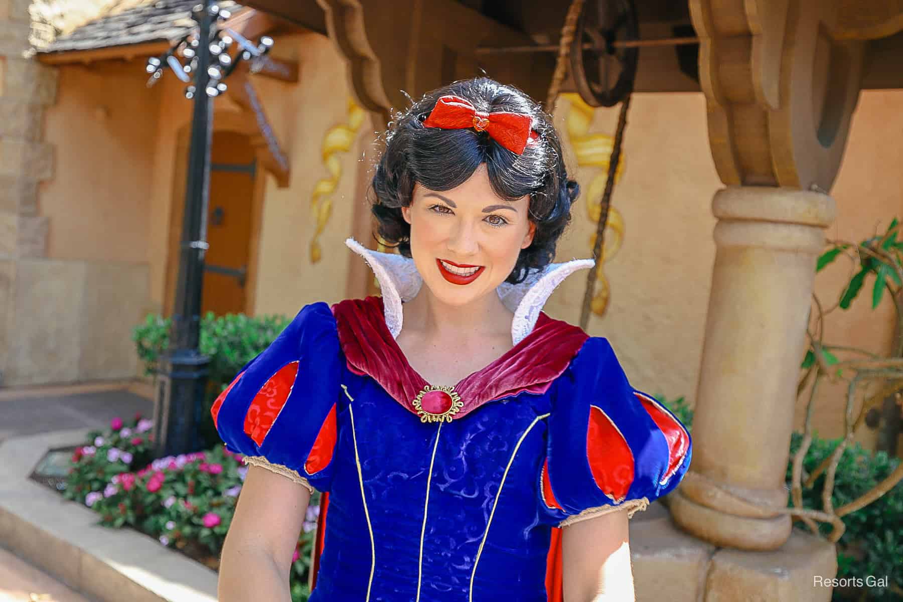 Snow White at her wishing well meet-and-greet at Epcot's Germany Pavilion. 