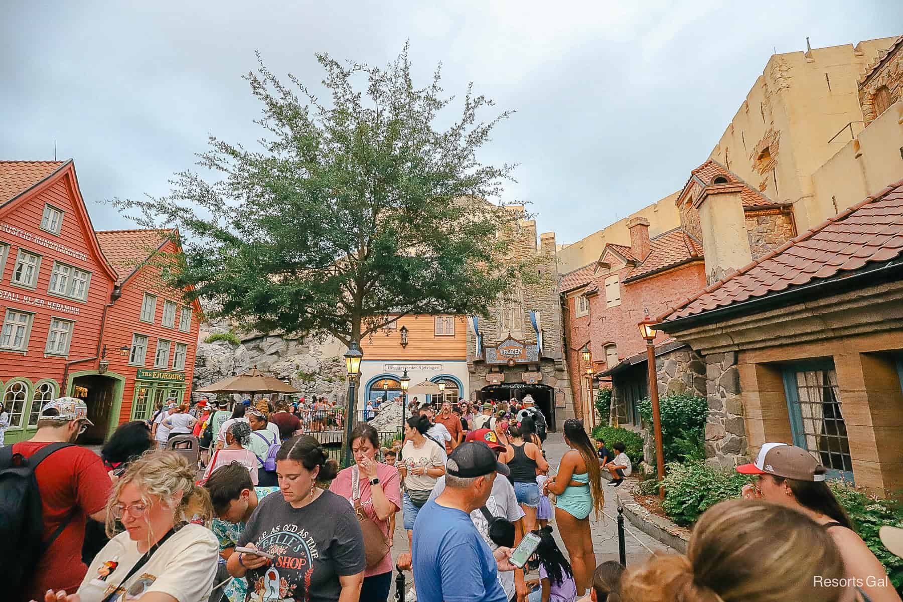 a long line of guests waiting to ride Frozen Ever After 