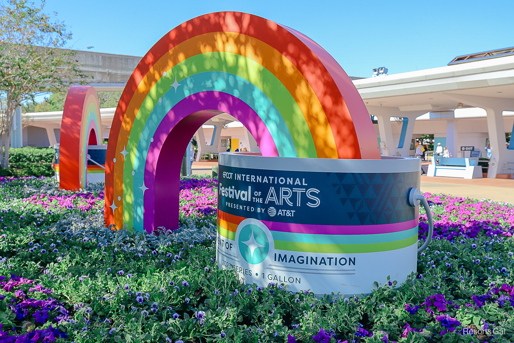 a giant paint can and rainbow at Epcot during the International Festival of the Arts 