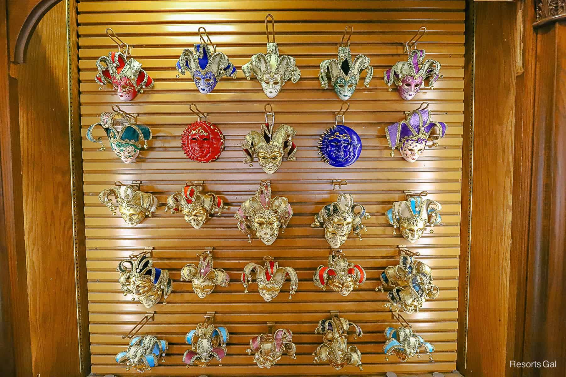 a wall with court jester masks 