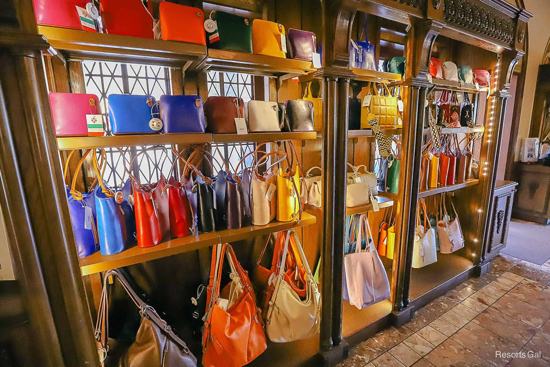 a wall with purses on display in Italian leather 