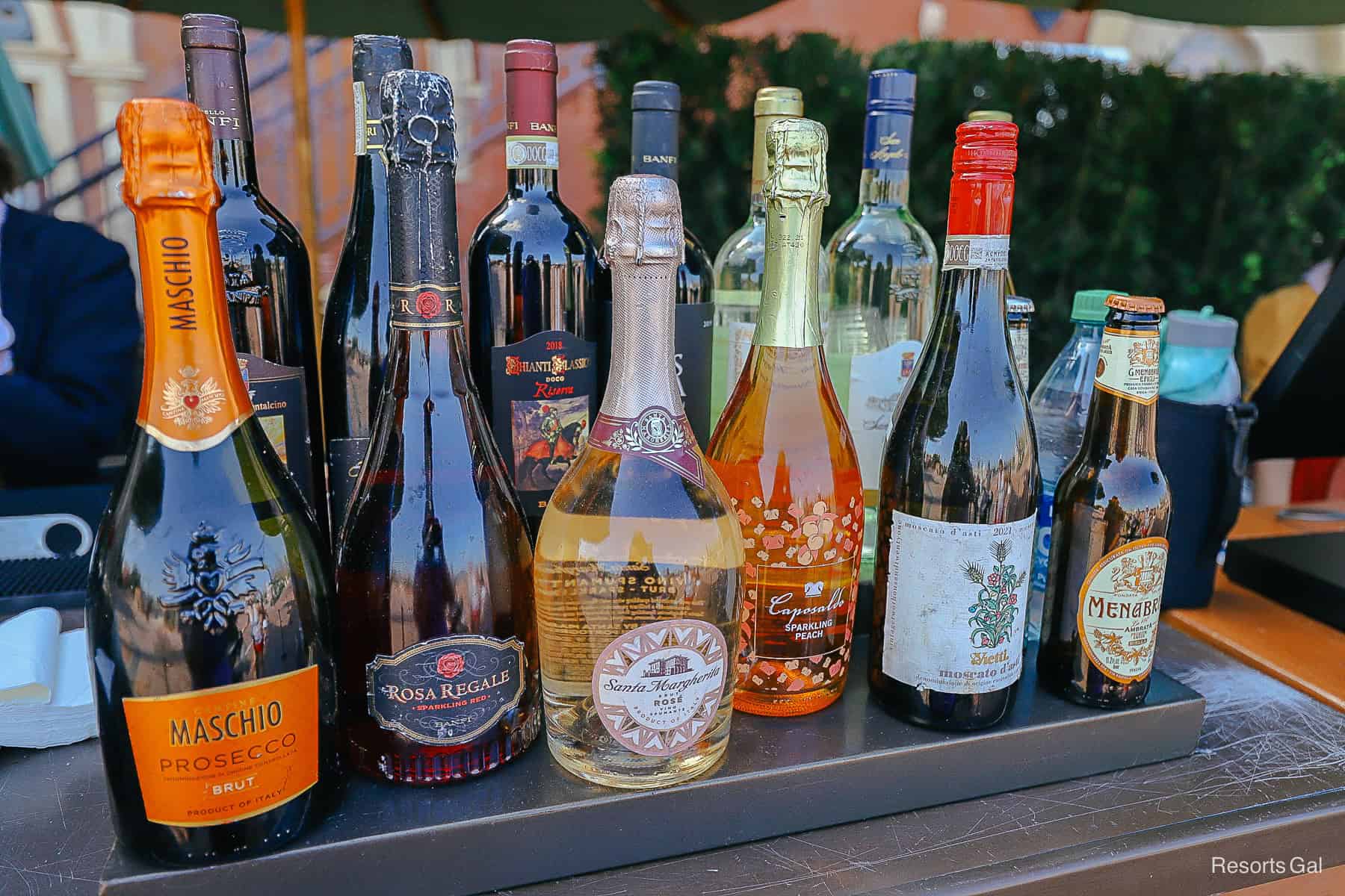 a selection of cordials, liquors, and wine 