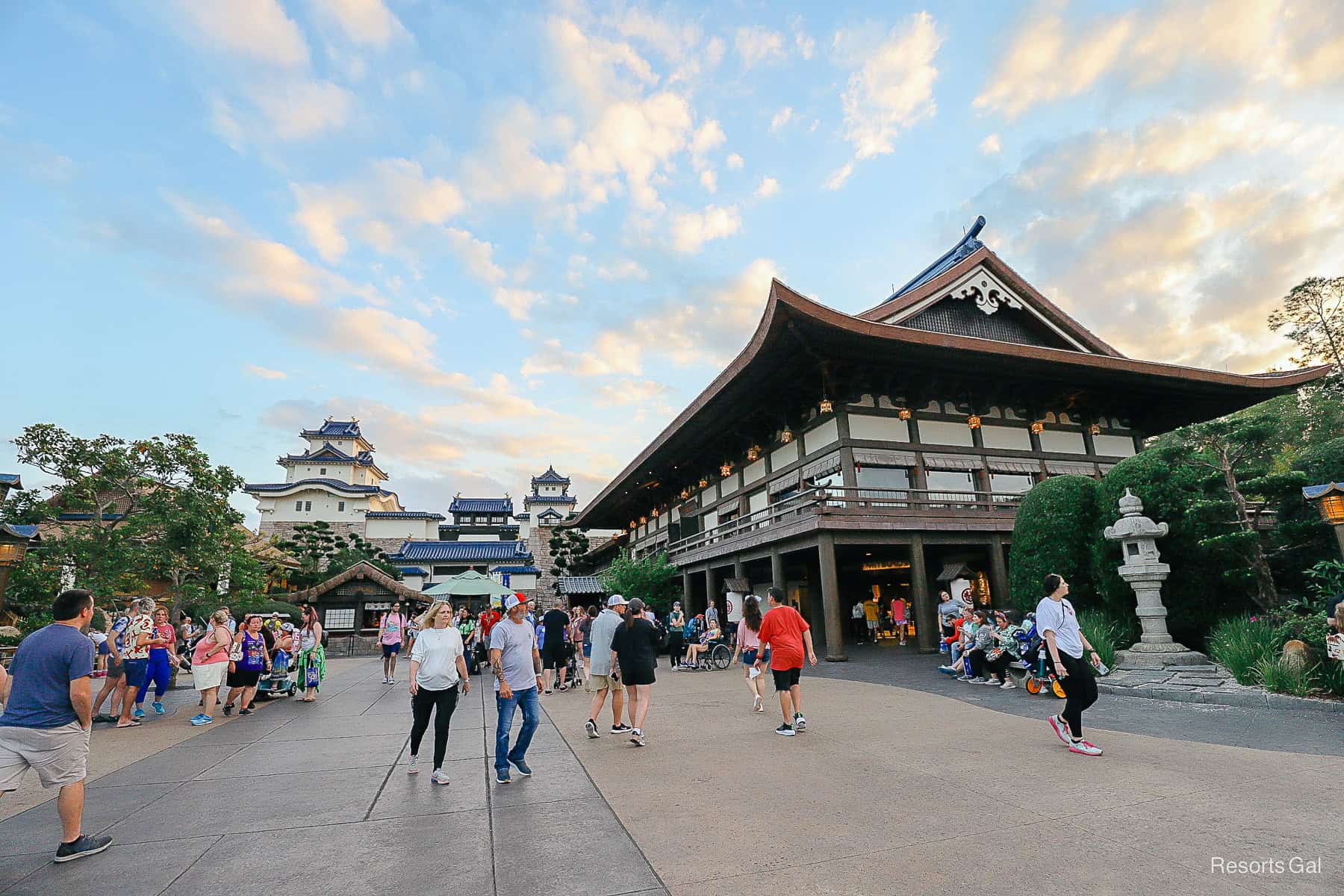 guests entering the Japan Pavilion at sunset with pretty sky 