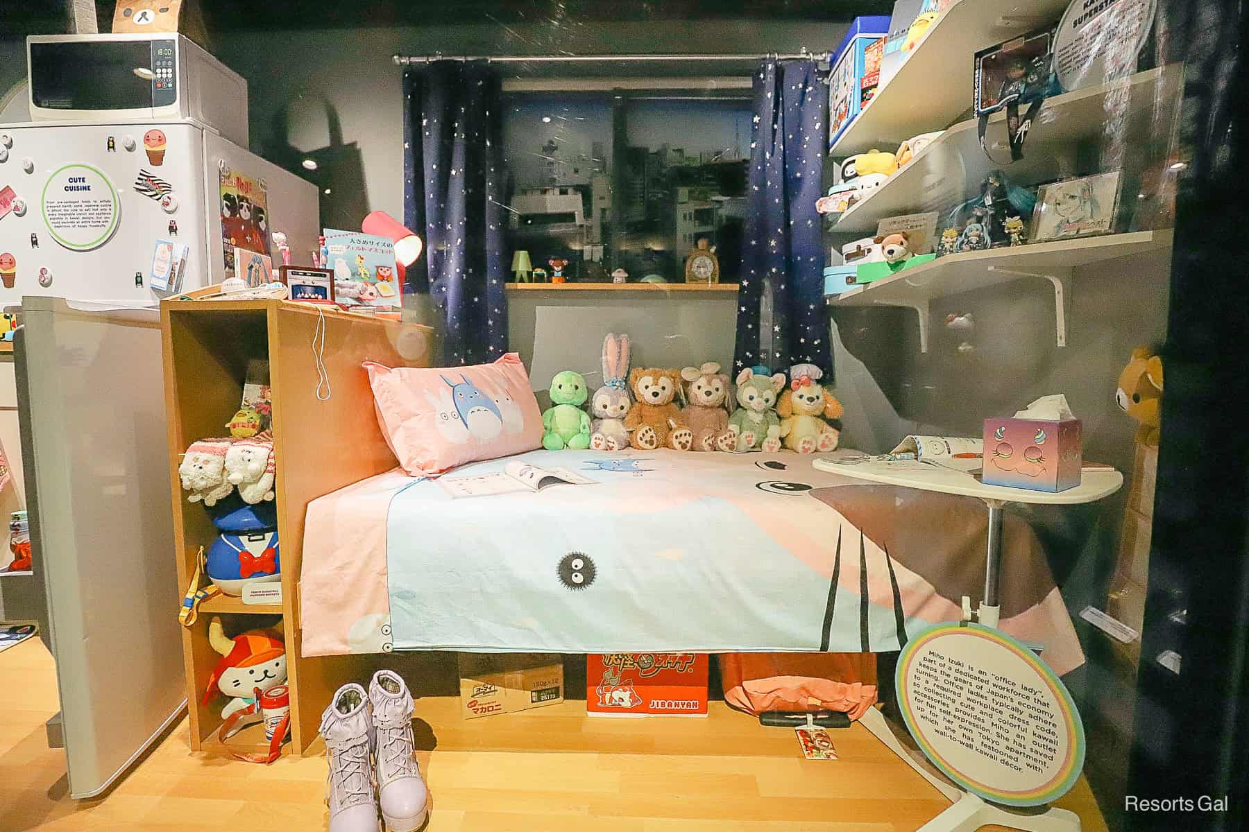 a Kawaii bedroom display example with bright colors, compact quarters, and lots of accessories 