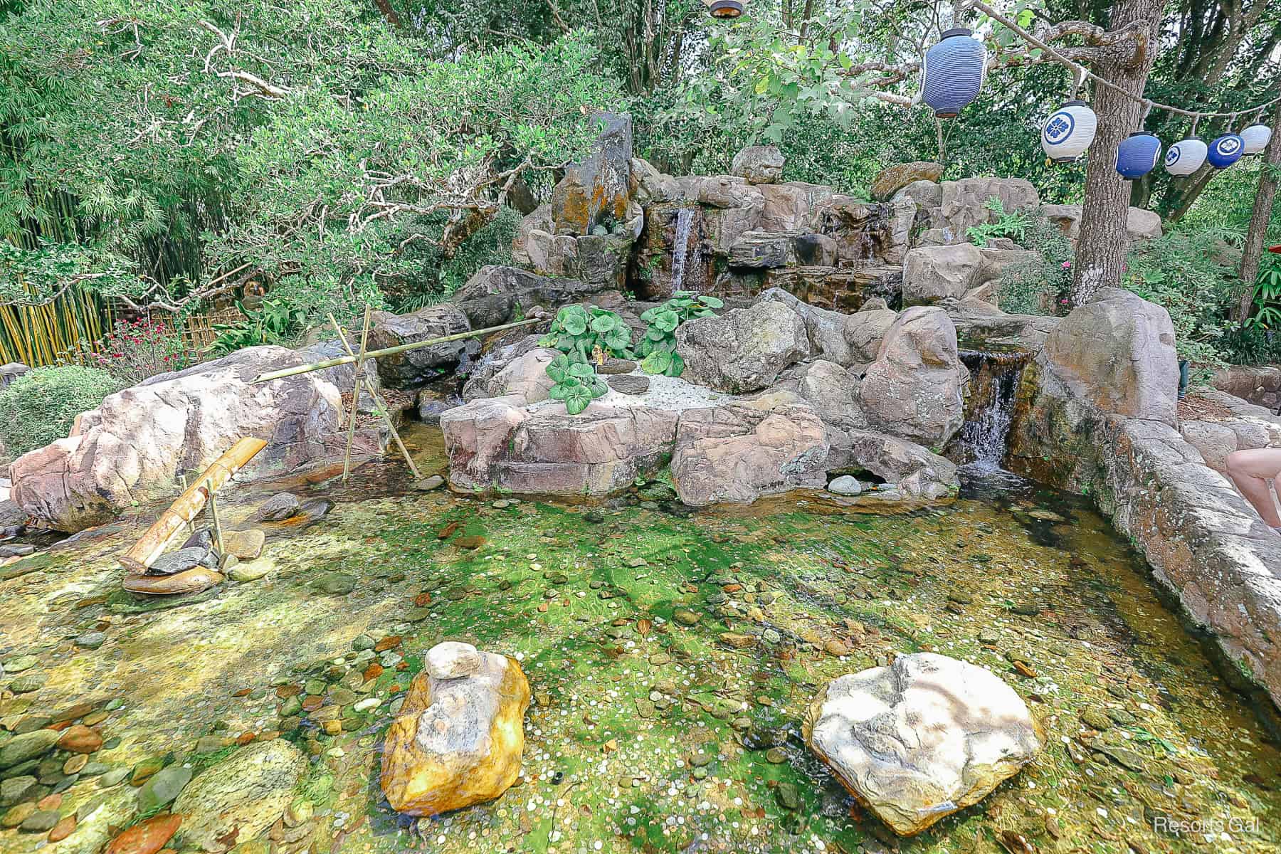 a waterfall with rock garden in the Japan Pavilion 