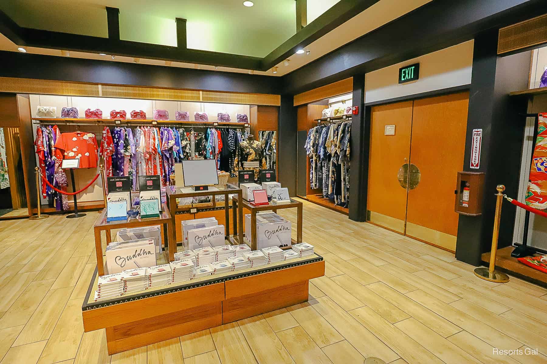 a large room with Kimonos and accessories 