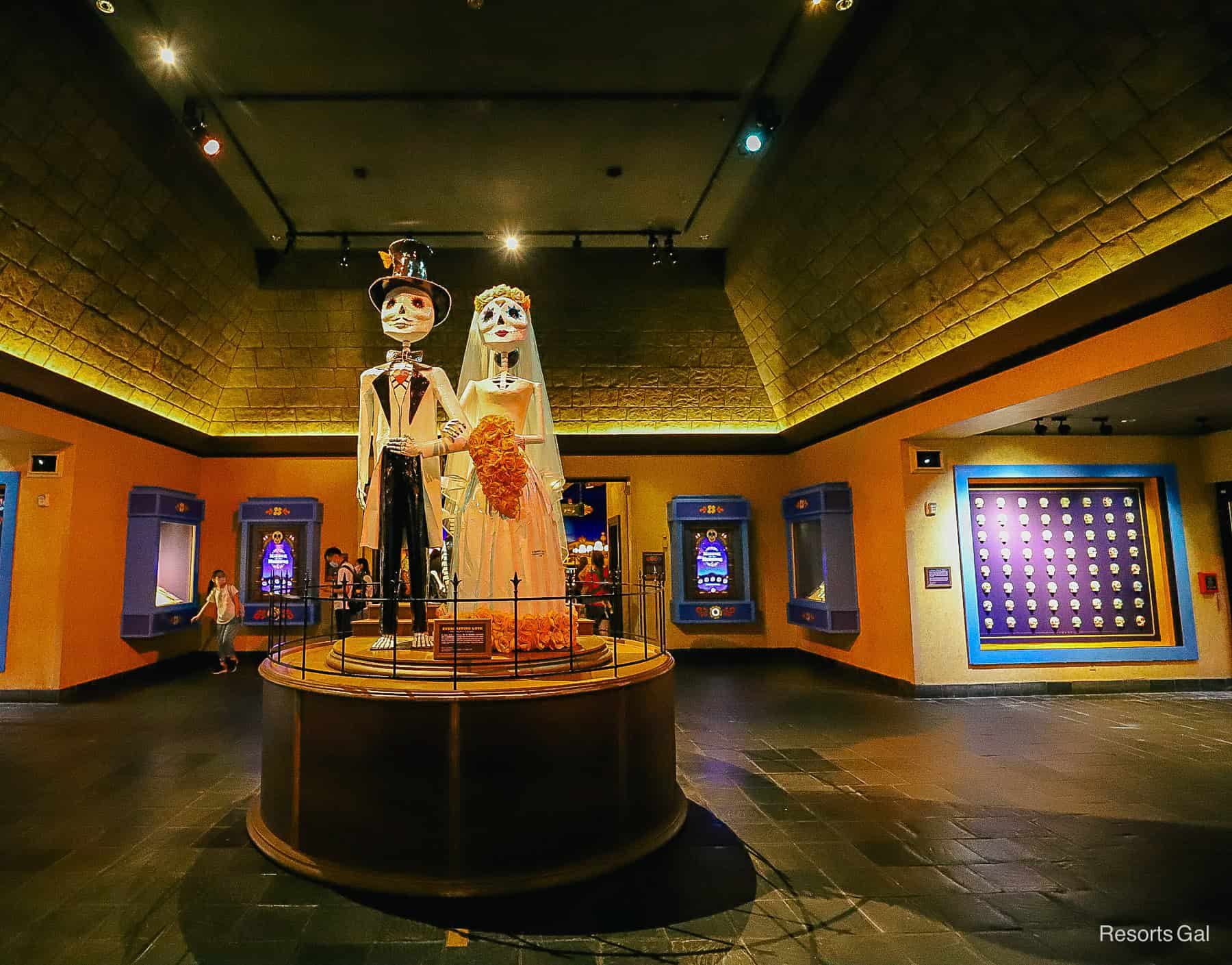 the skeleton bride and groom as part of the Remember me exhibit at Epcot 